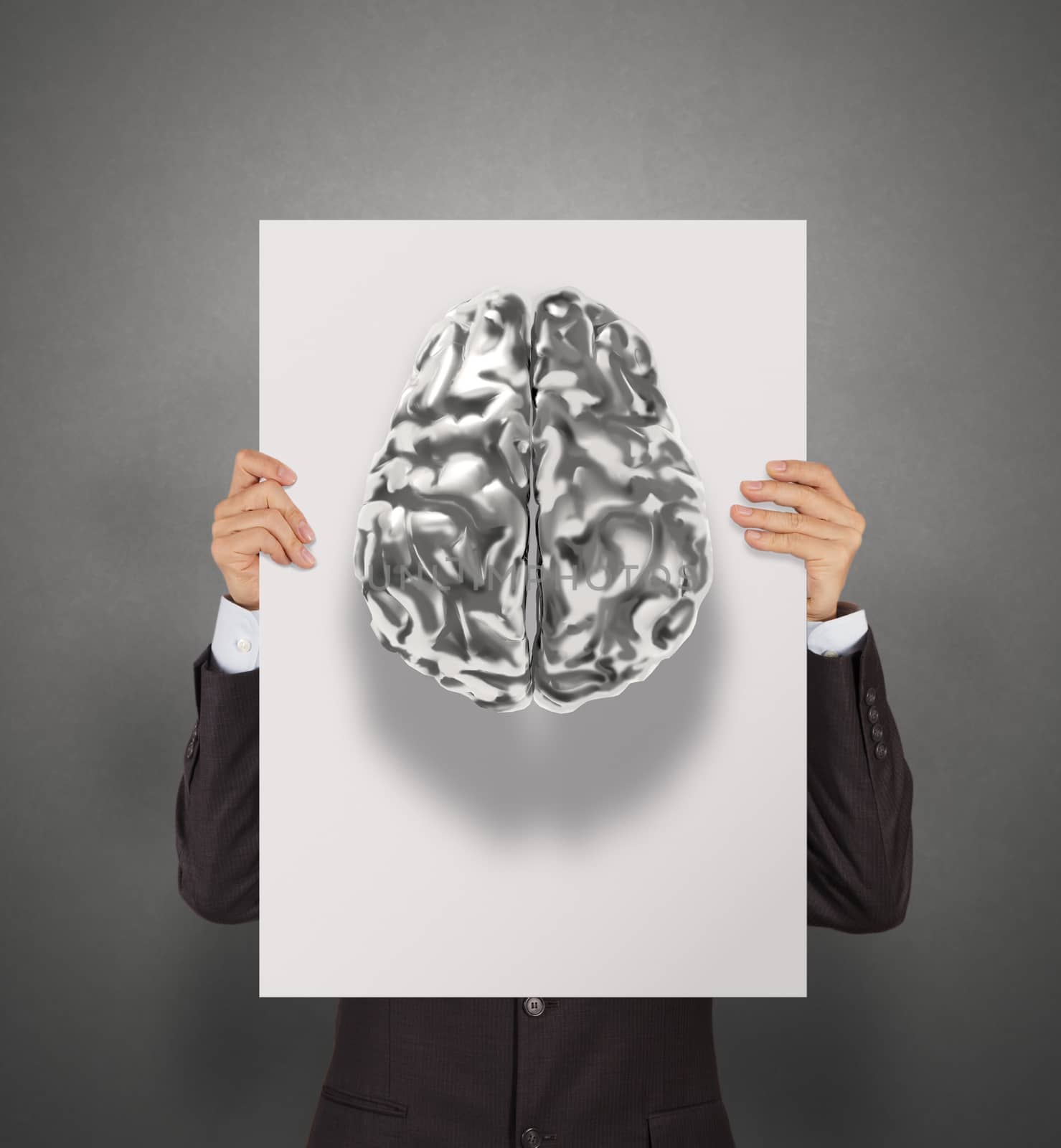 businessman hand showing poster of 3d metal human brain as security concept 