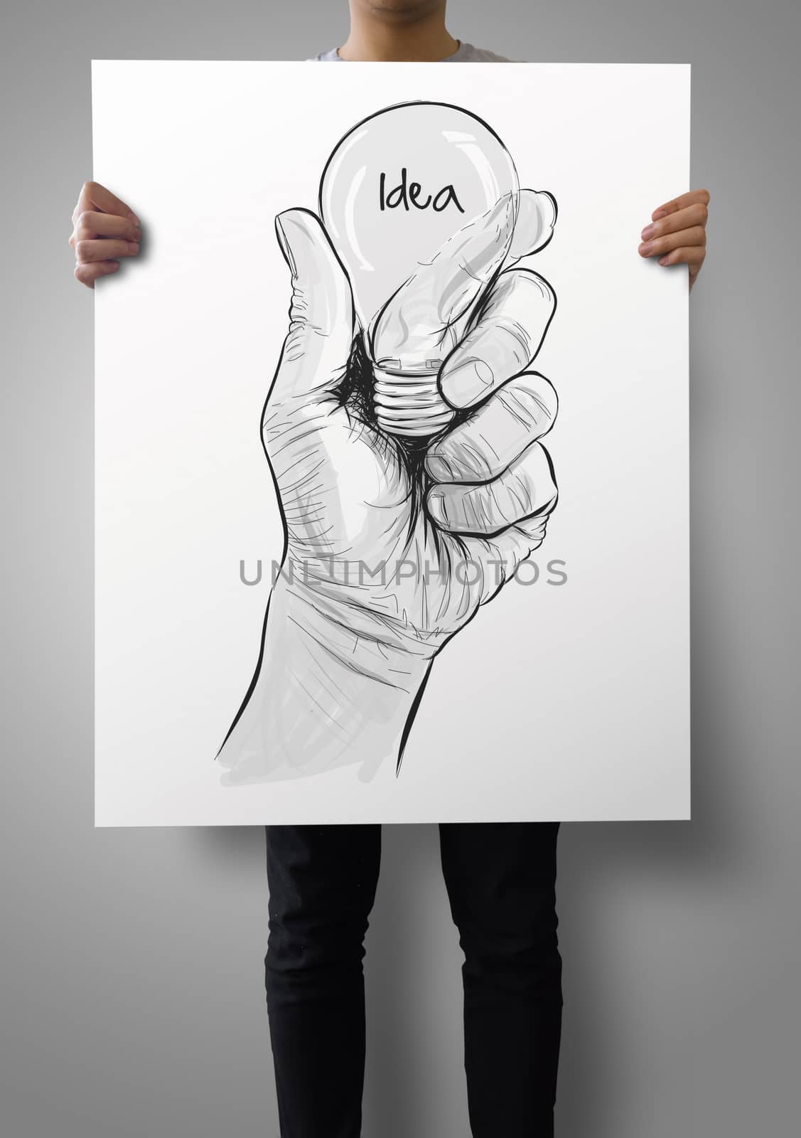 man showing poster of Hand drawn light bulb with IDEA word  as concept
