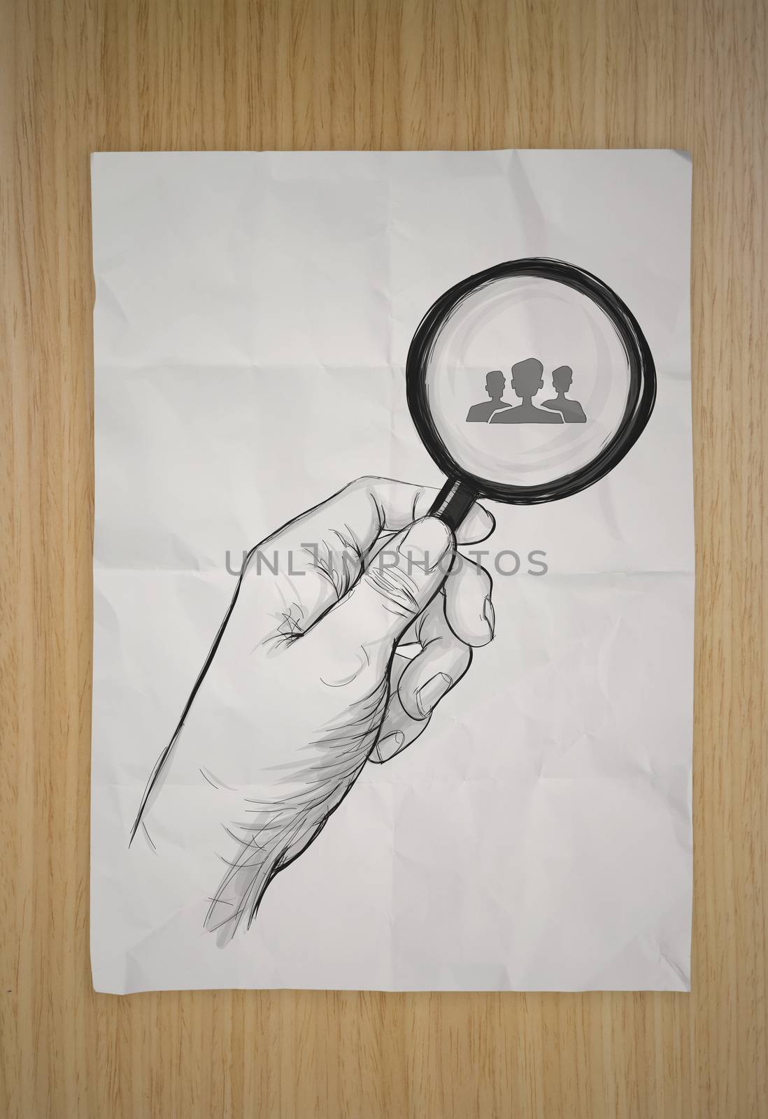 drawing of hand holding magnifier glass looking for employee on crumpled paper and wooden background as concept 