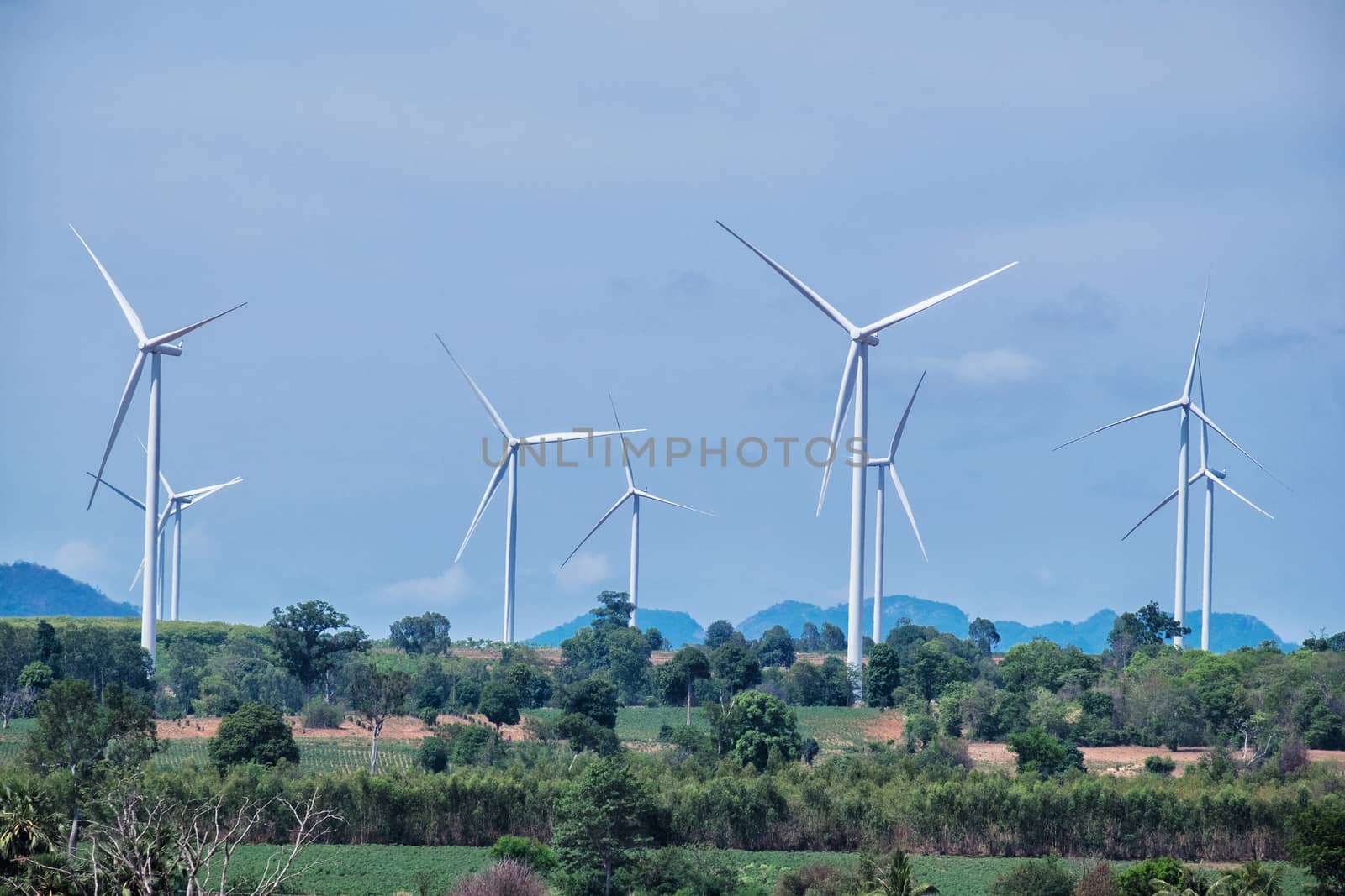 Wind turbine power at daylight  by Surasak