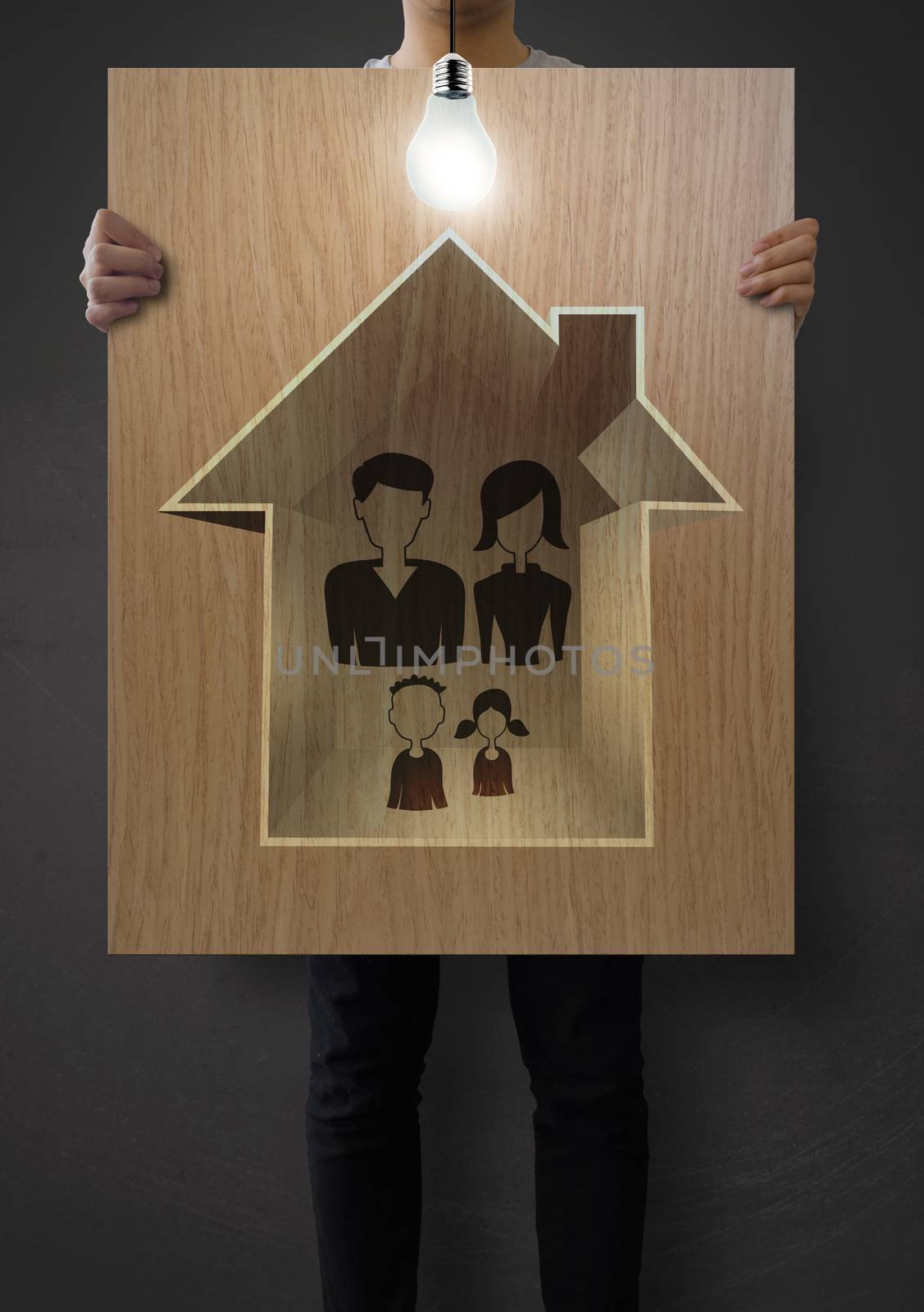 man show hand draw family and house on wooden poster as insurance concept