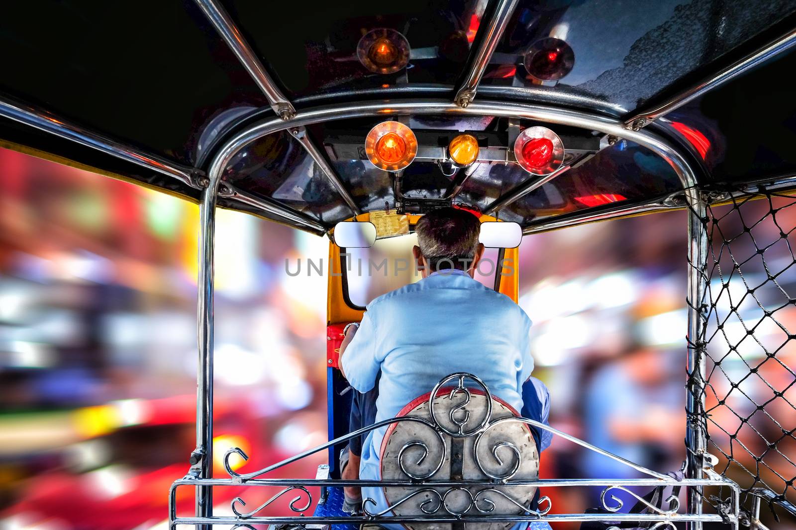 Thailand Tuk Tuk three wheel native taxi on night view bokeh background 