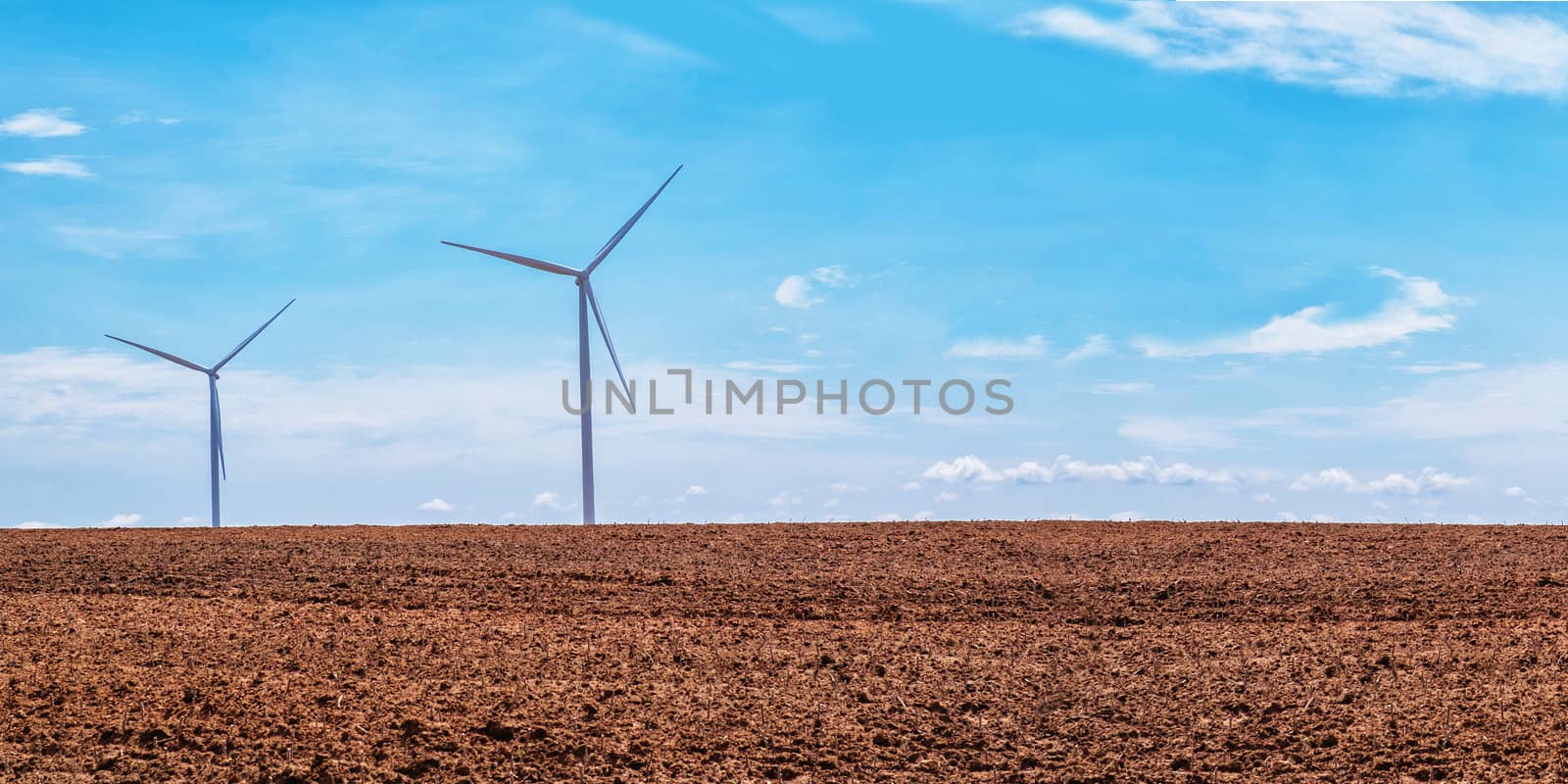 Wind turbine power Free space for design and text. by Surasak