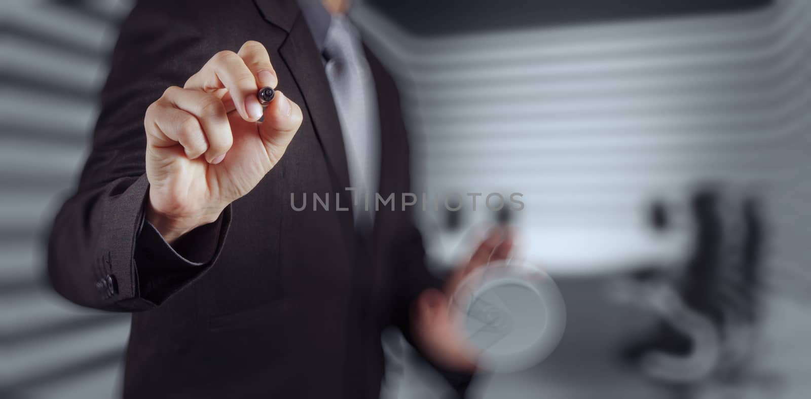 Businessman hand pressing an imaginary button on virtual screen by everythingpossible