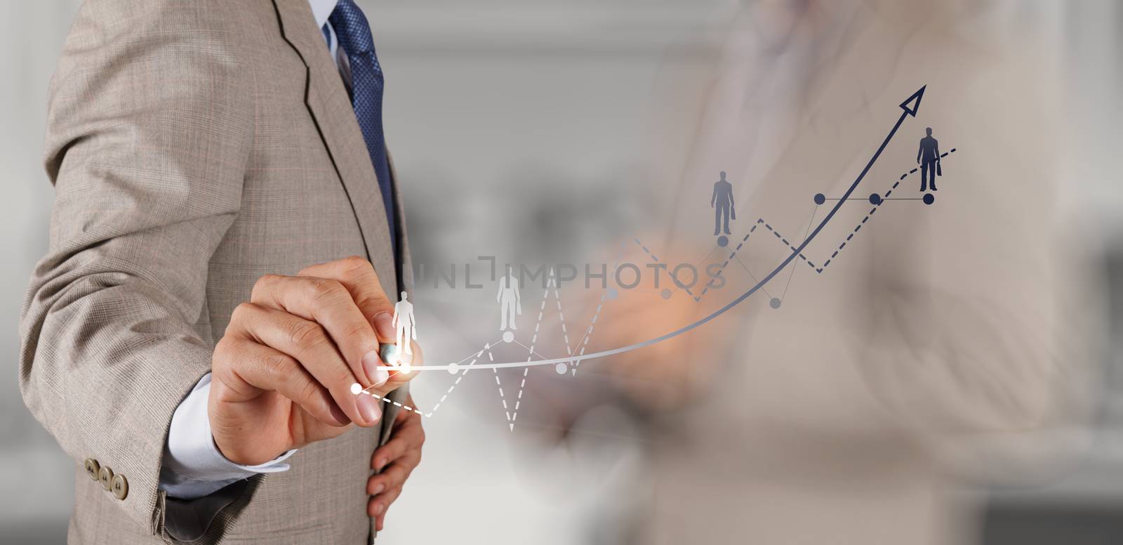 businessman hand and team working with new modern computer and business strategy as concept