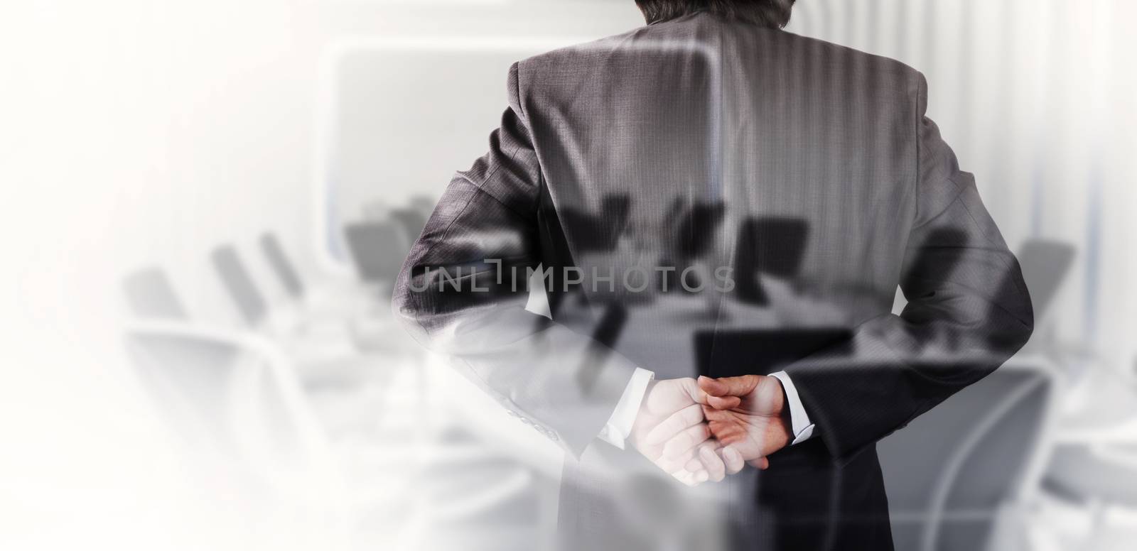 Double exposure of businessman success with his board room background 
