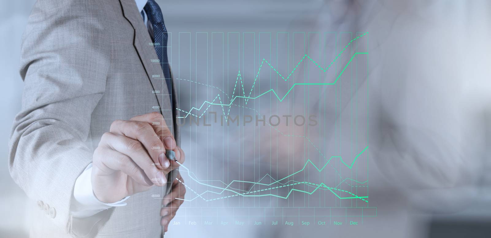 businessman hand working with new modern computer and business s by everythingpossible