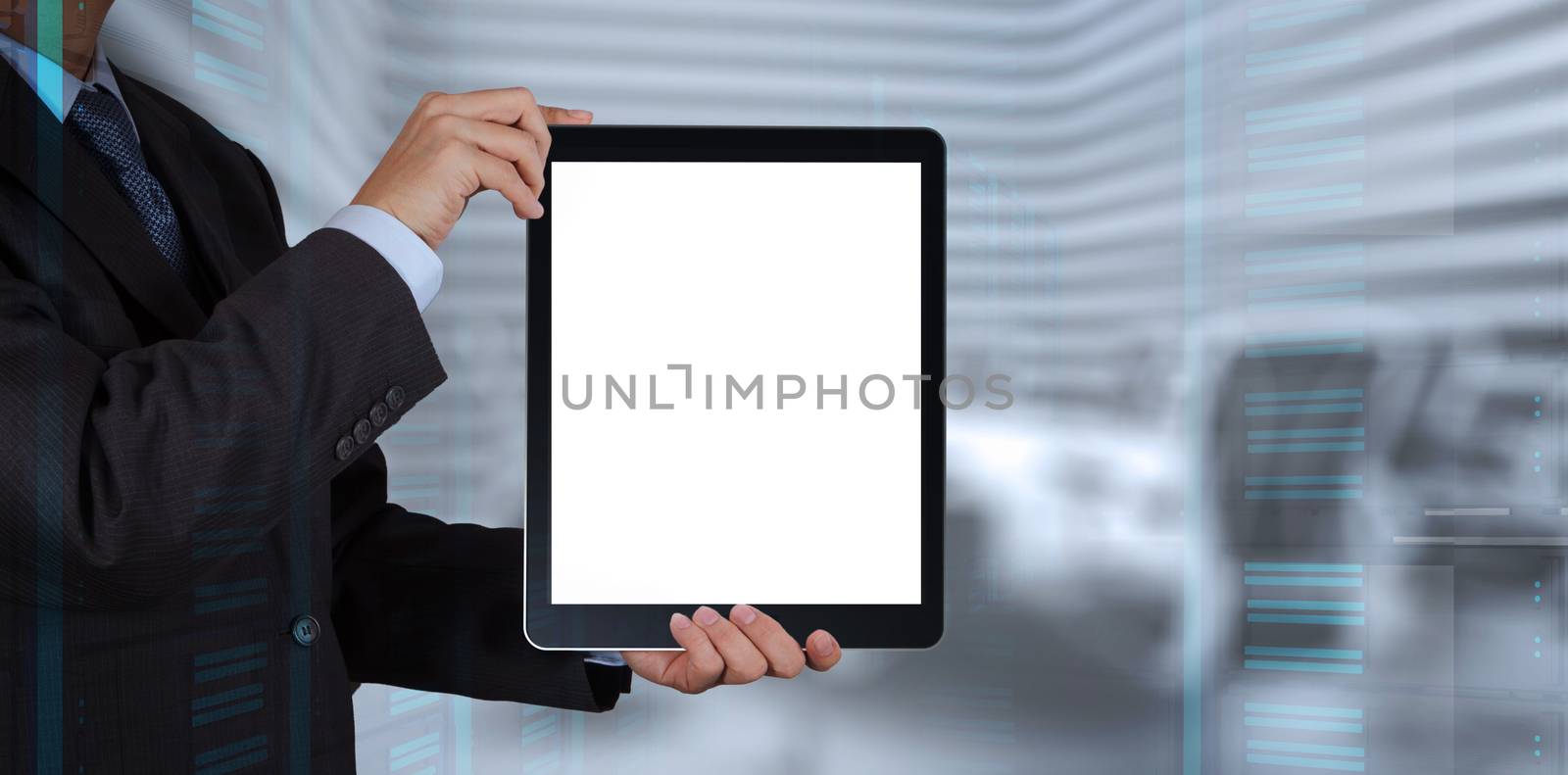 businessman success working with blank tablet computer his board by everythingpossible