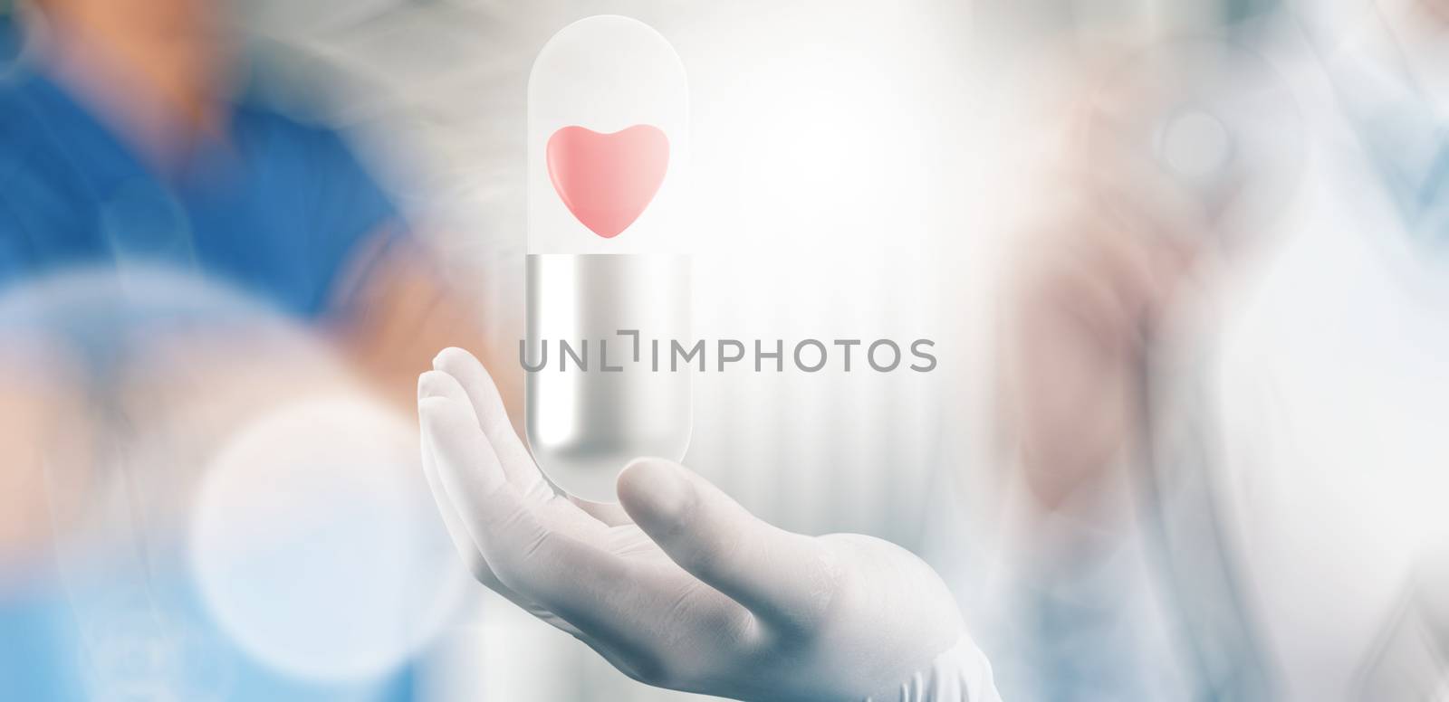 medical hand with glove heart inside capsule pill as concept 