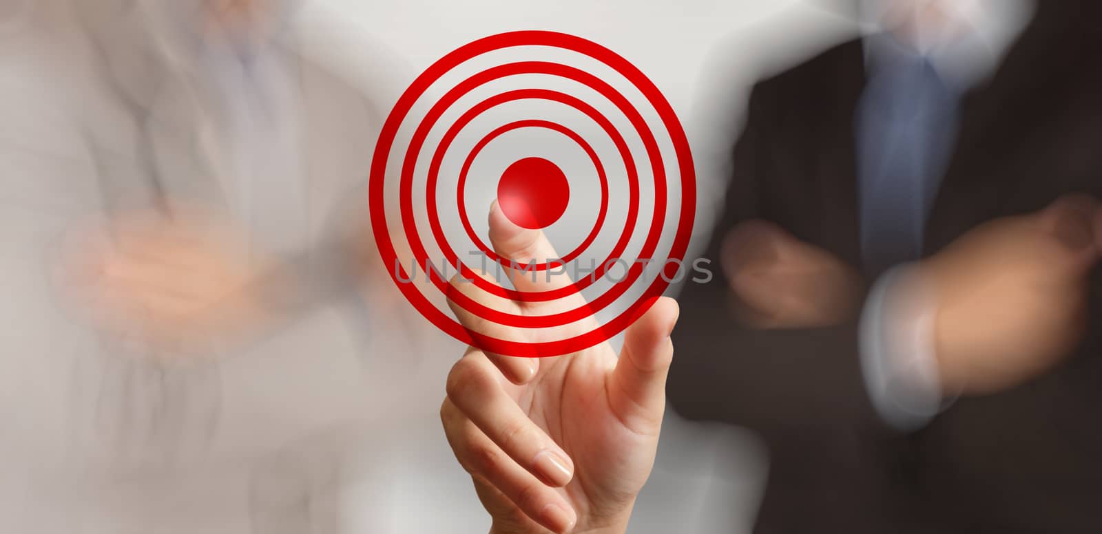 businessman hand shows target symbol as business concept 
