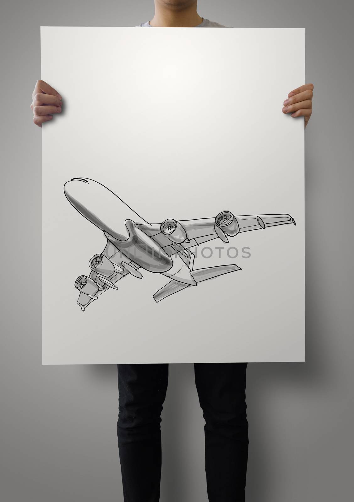 man showing hand drawn airplane on poster paper background by everythingpossible
