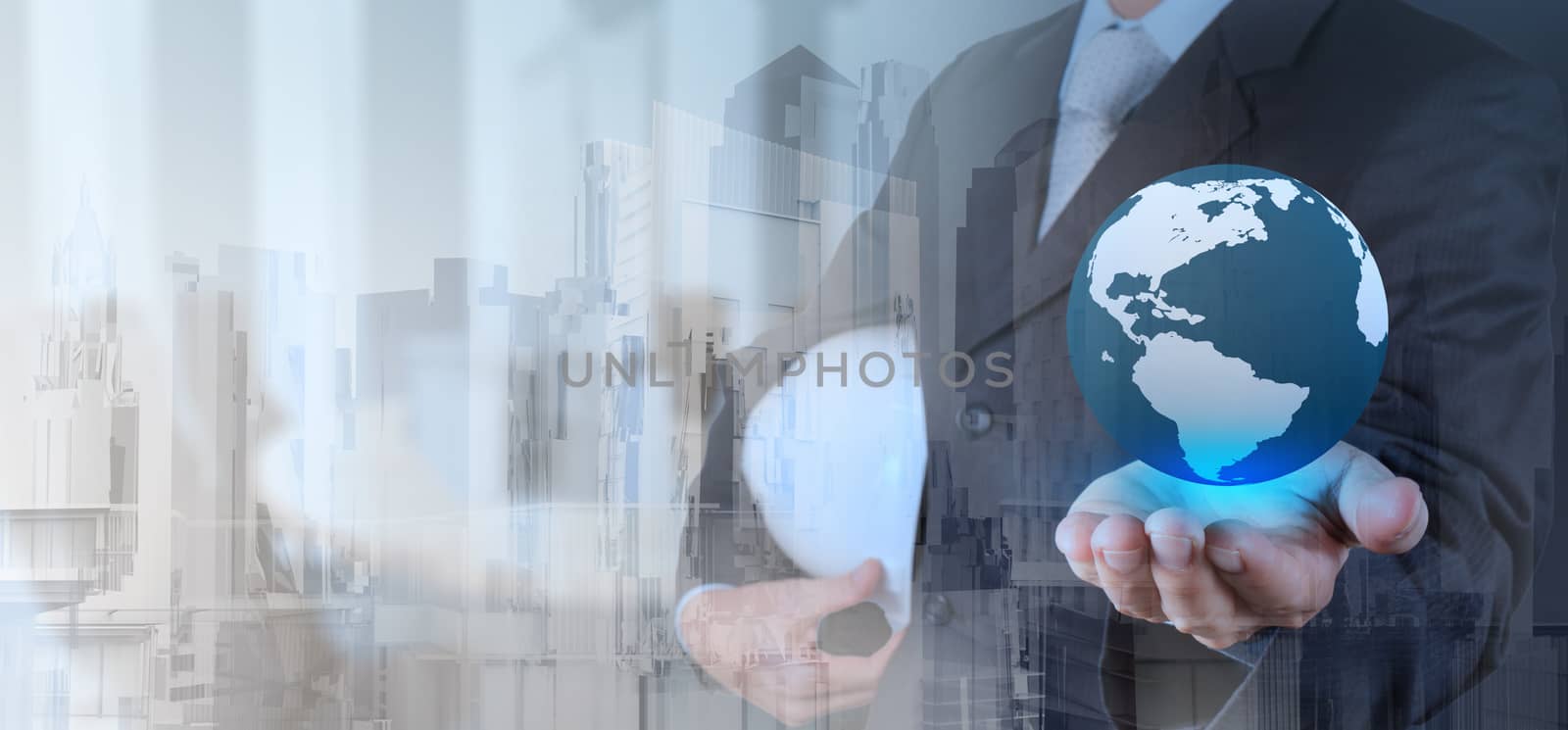 Double exposure of business engineer holding the earth and abstr by everythingpossible