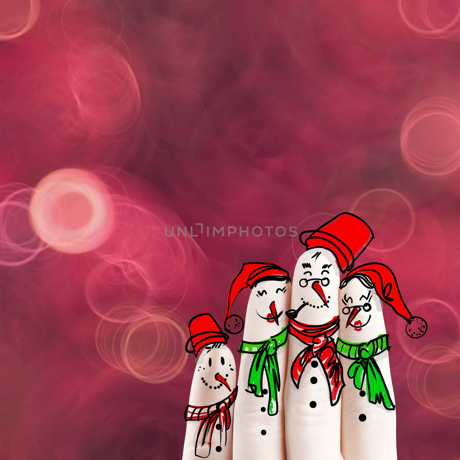 A lovely family hand drawn and finger of snowmen on flowers natu by everythingpossible