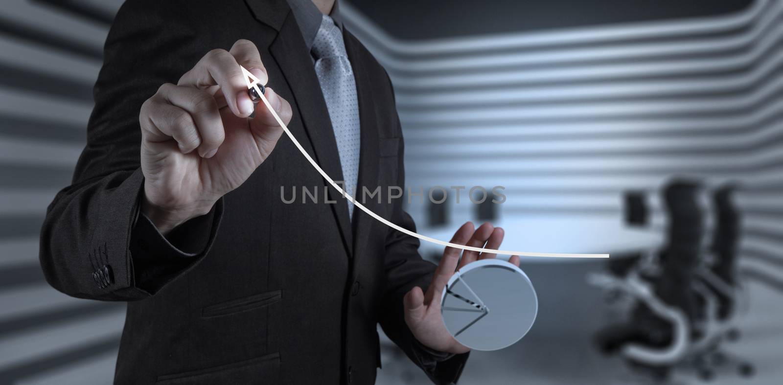 businessman hand working with new modern computer and business s by everythingpossible