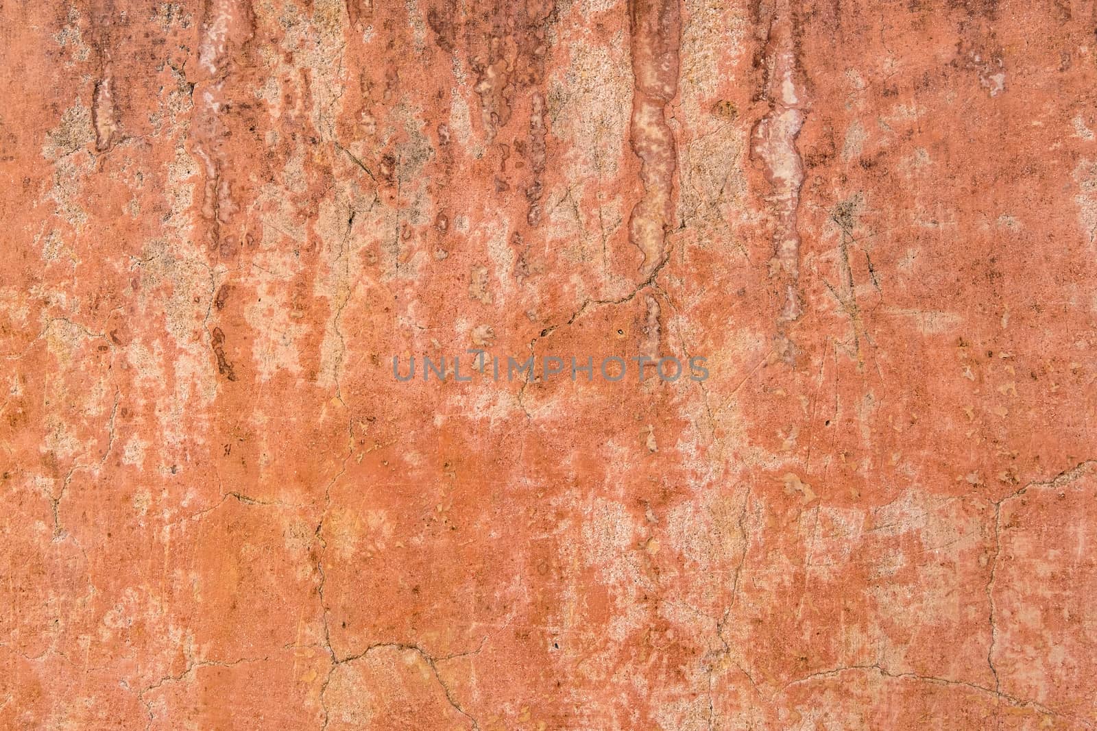 Brown adobe clay wall texture background. by Tanarch