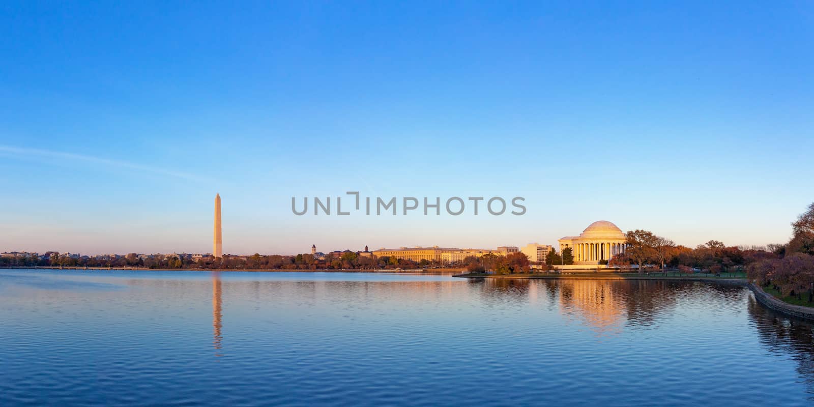 Jeffeerson Memorial and Washington Monument reflected on Tidal Basin in the evening. by Tanarch