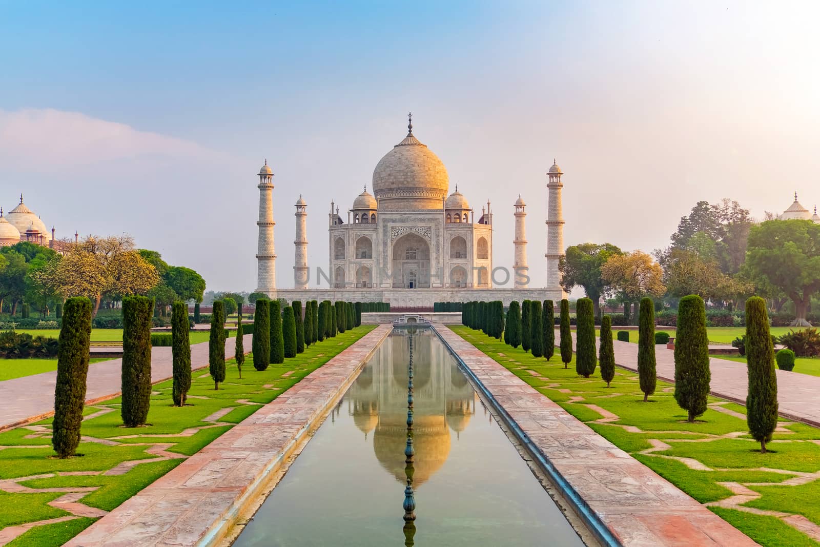 Taj Mahal front view reflected on the reflection pool. by Tanarch