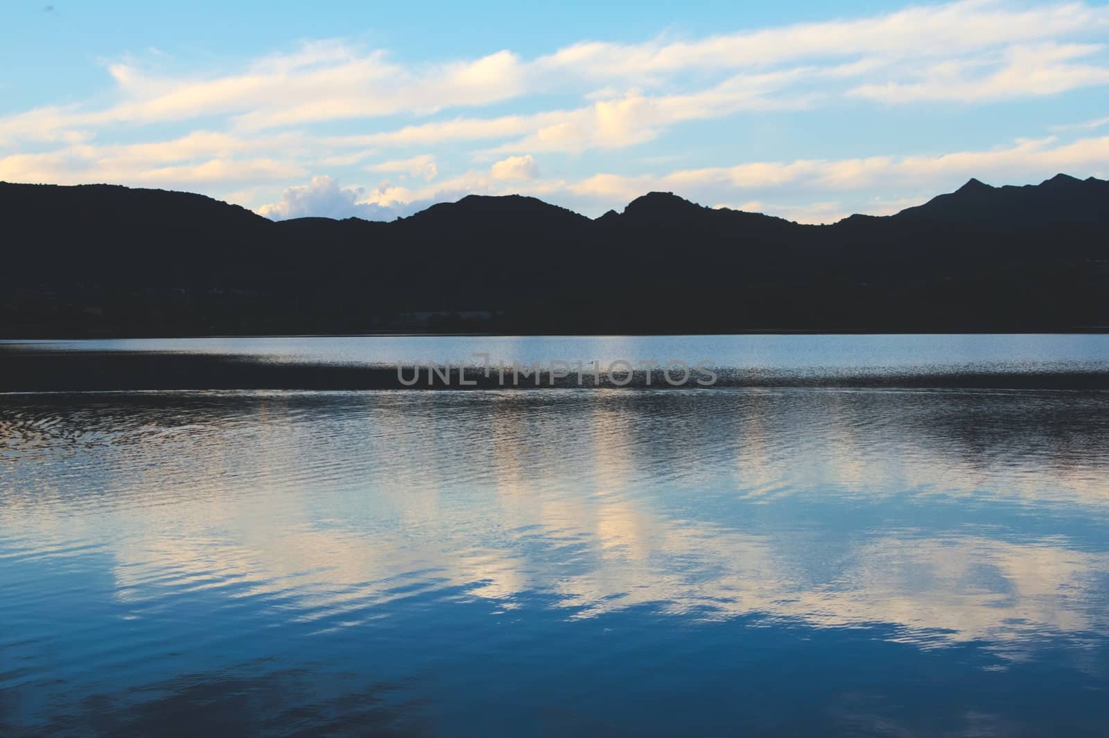 Blue twilight sky reflected on lake by hernan_hyper