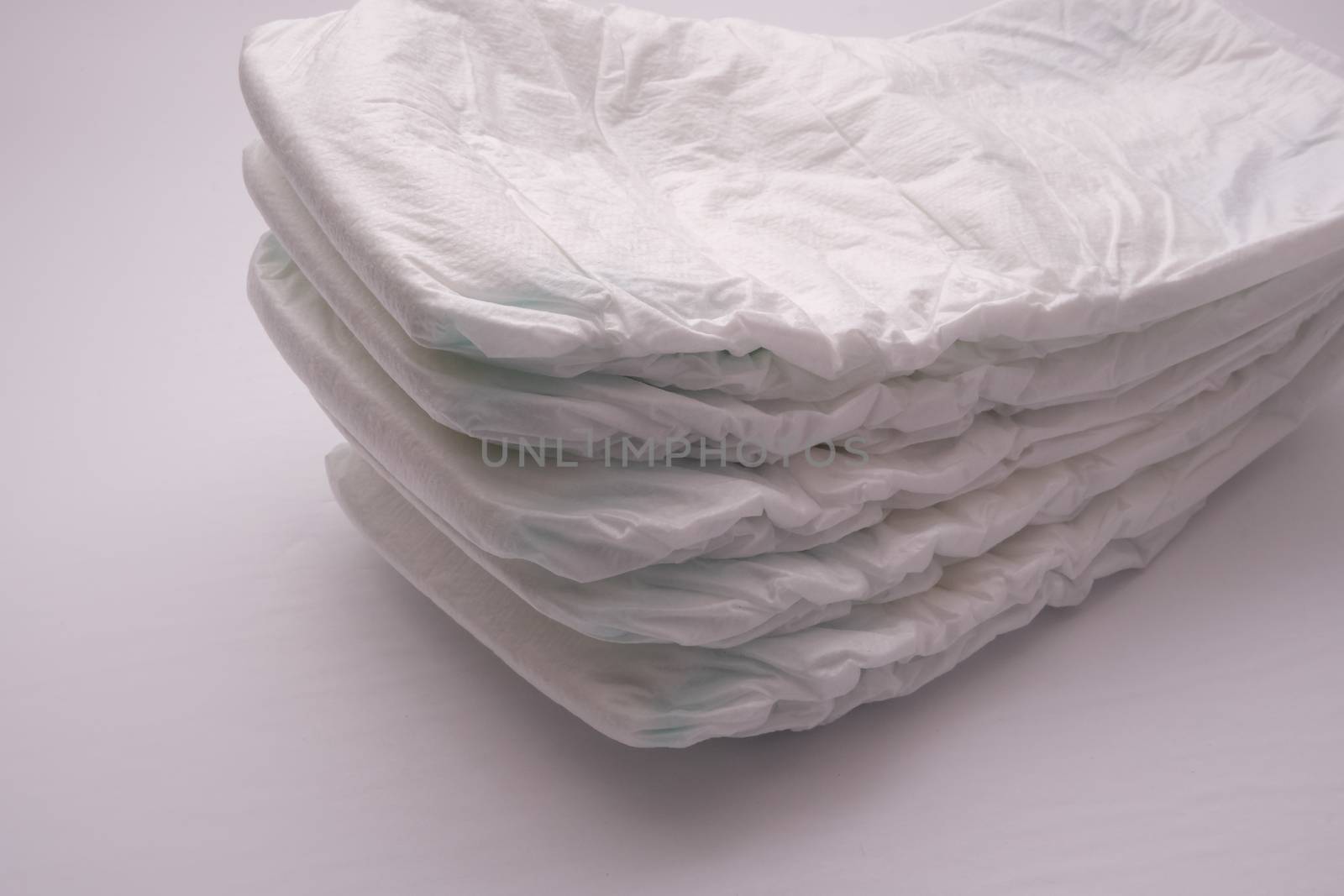 A Stack of Disposable Diapers by colintemple