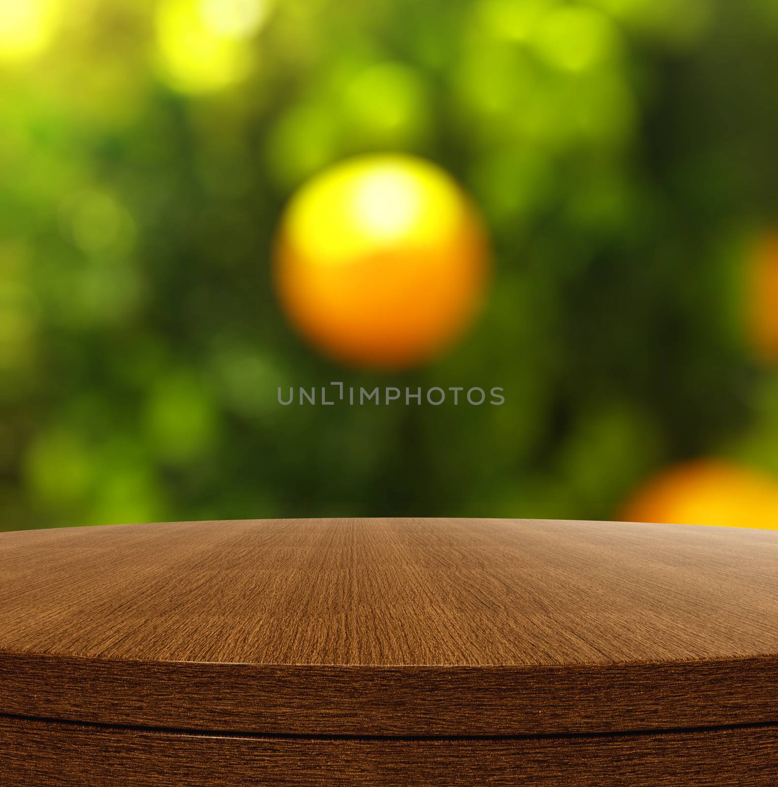 Empty wooden round table and blurred background for product presentation 