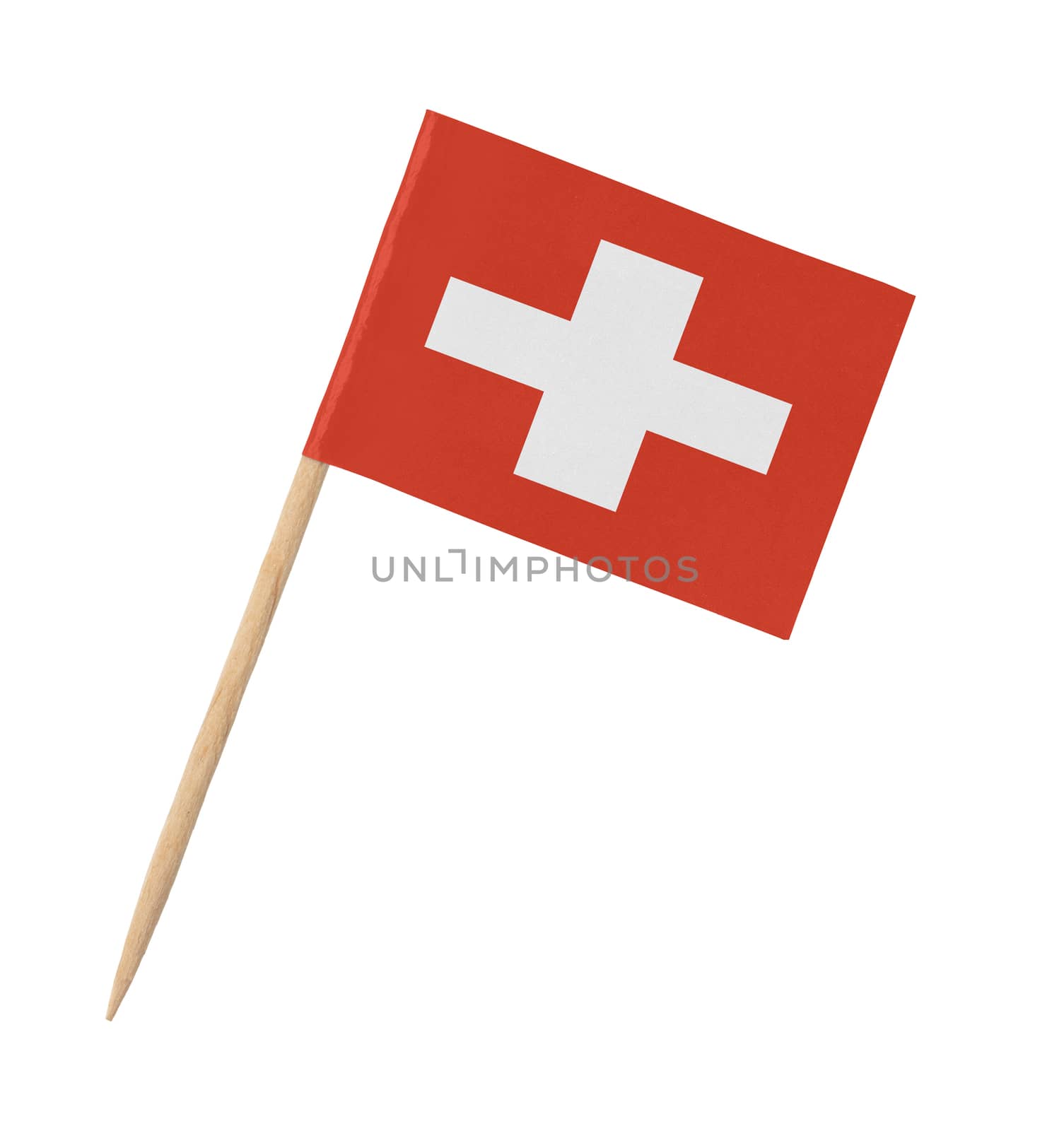 Small paper flag of Switzerland on wooden stick, isolated on white