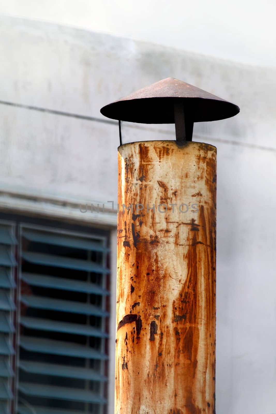 Smokestack steel on Industrial roof or home, Pollution smokestack small flue chimney with Smoke pollution