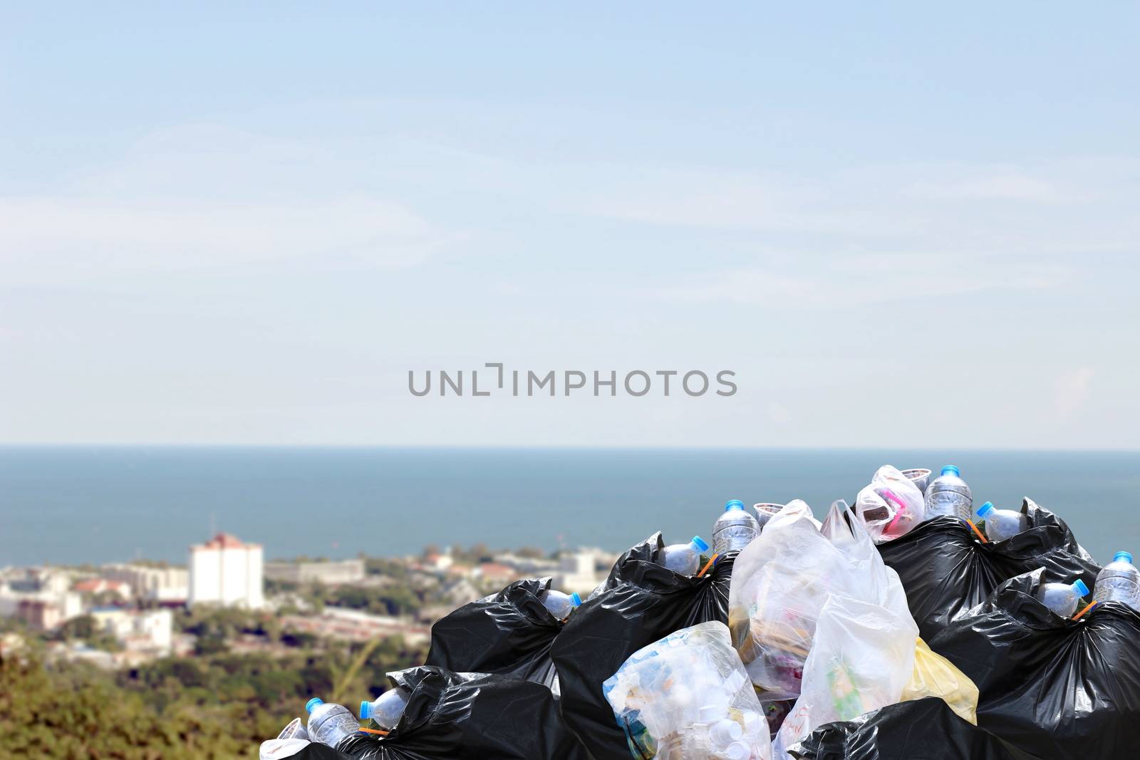 Lots waste plastic heap, Garbage heap, Waste plastic many, Pollution Garbage bin pile Dump Lots of junk Polluting at front City community and sea location landscape background by cgdeaw