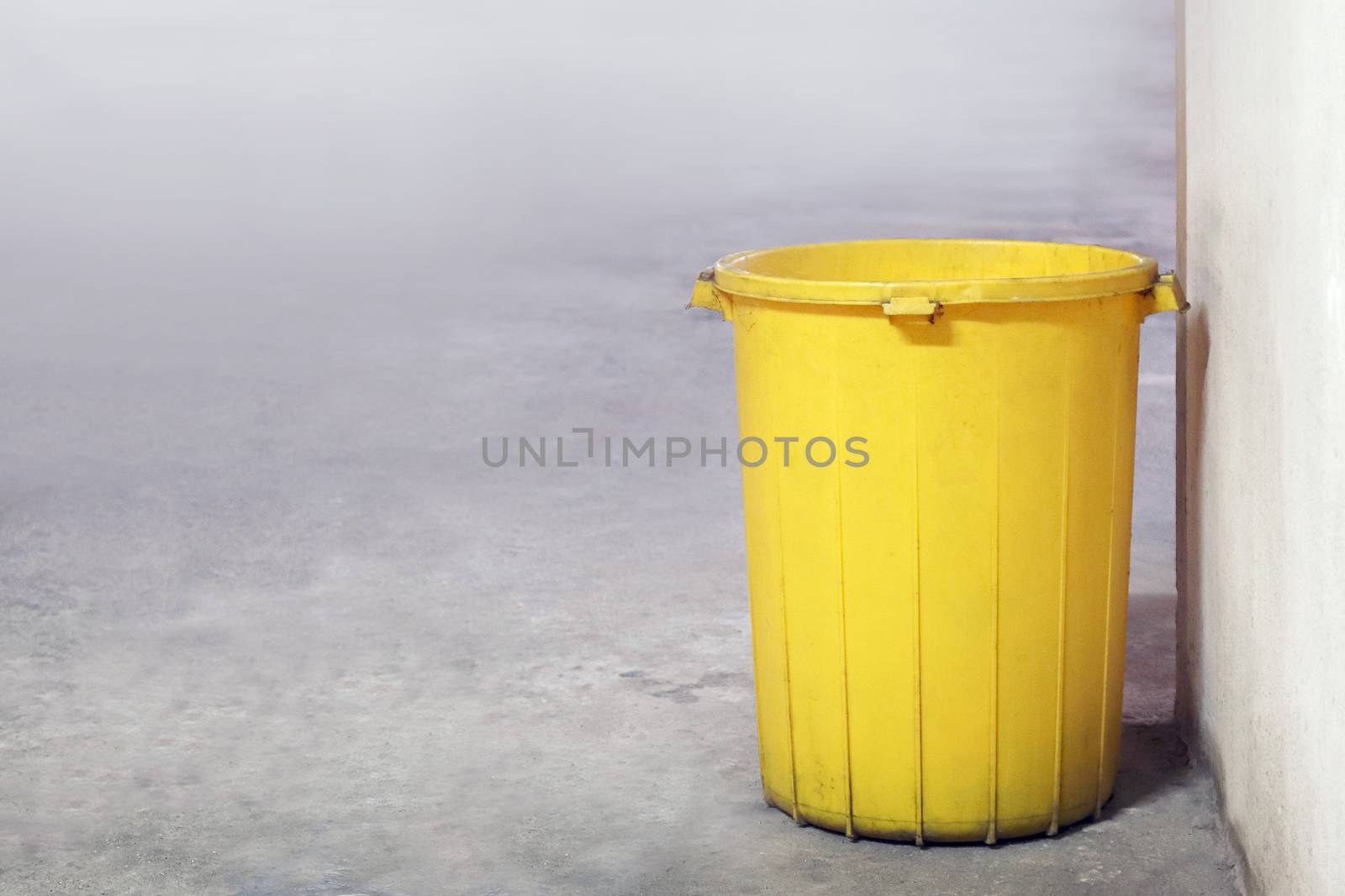 bin plastic yellow color old for waste dump, empty bin for garbage waste on floor, dirty bin plastic, trash bin for recycle waste by cgdeaw
