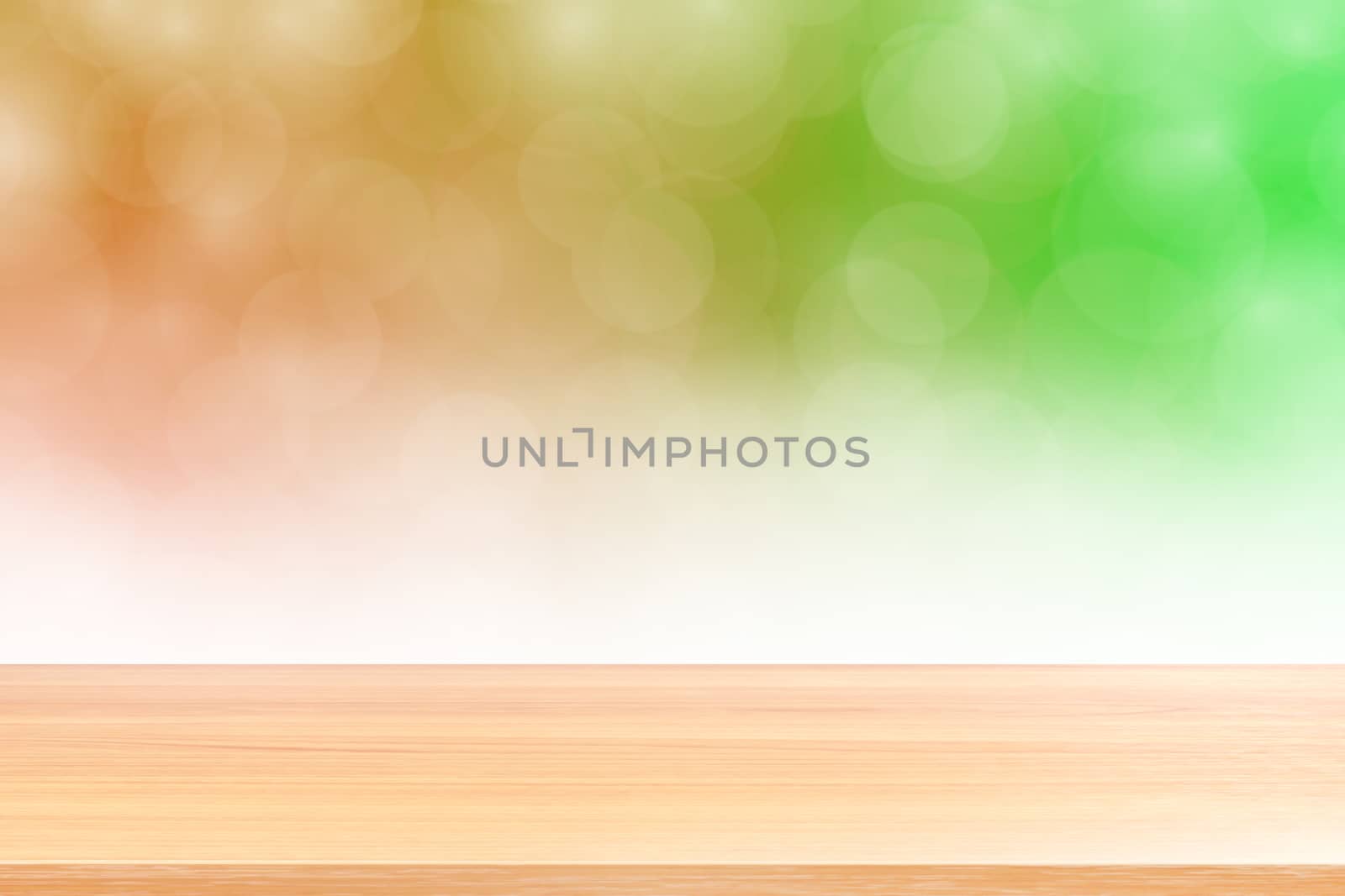 empty wood table floors on blurred bokeh soft green gradient background, wooden plank empty on green bokeh colorful light shade, colorful bokeh lights gradient soft for banner advertising products