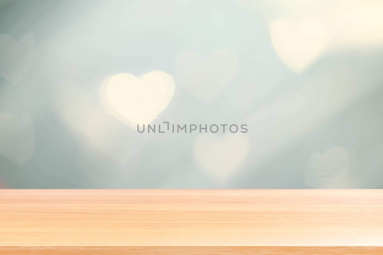 wood plank on lighting soft heart shaped bokeh for valentine background, empty wood table floors on heart shape bokeh night light multi color background, wood table board empty on bokeh heart shape