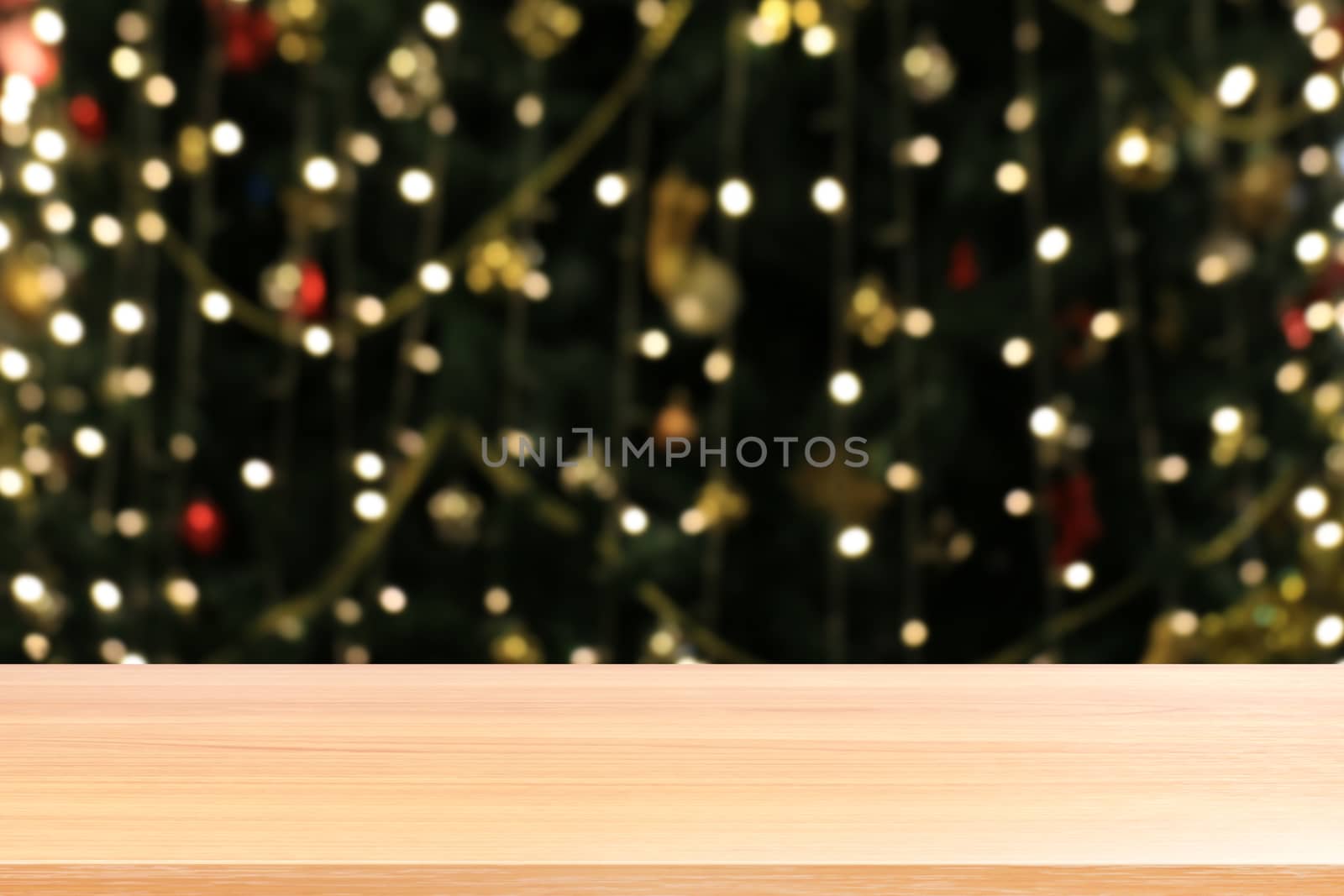 wood plank on lighting blurred christmas tree decoration background, empty wood table floors on lighting green christmas bokeh, wood table board empty front green glitter background light colorful