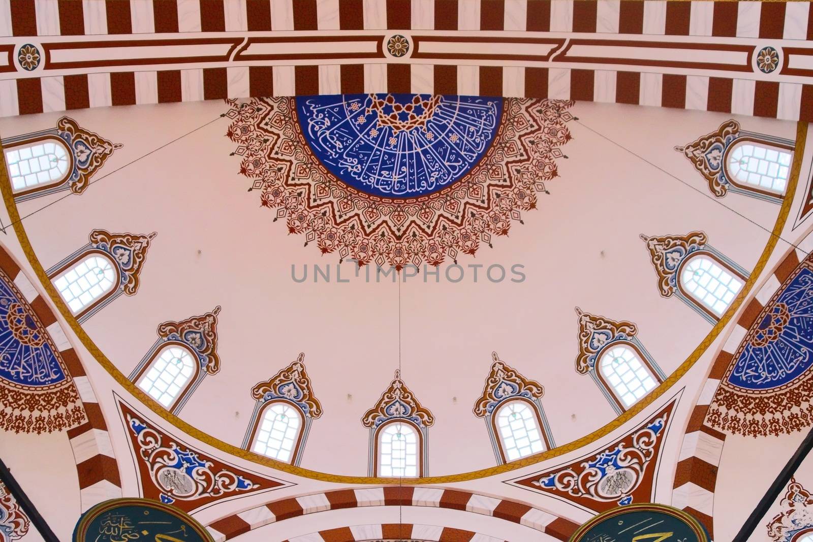 Islamic art decoration at the Sehzade Mosque in Istanbul, Turkey. Interior view of the main dome. by hernan_hyper