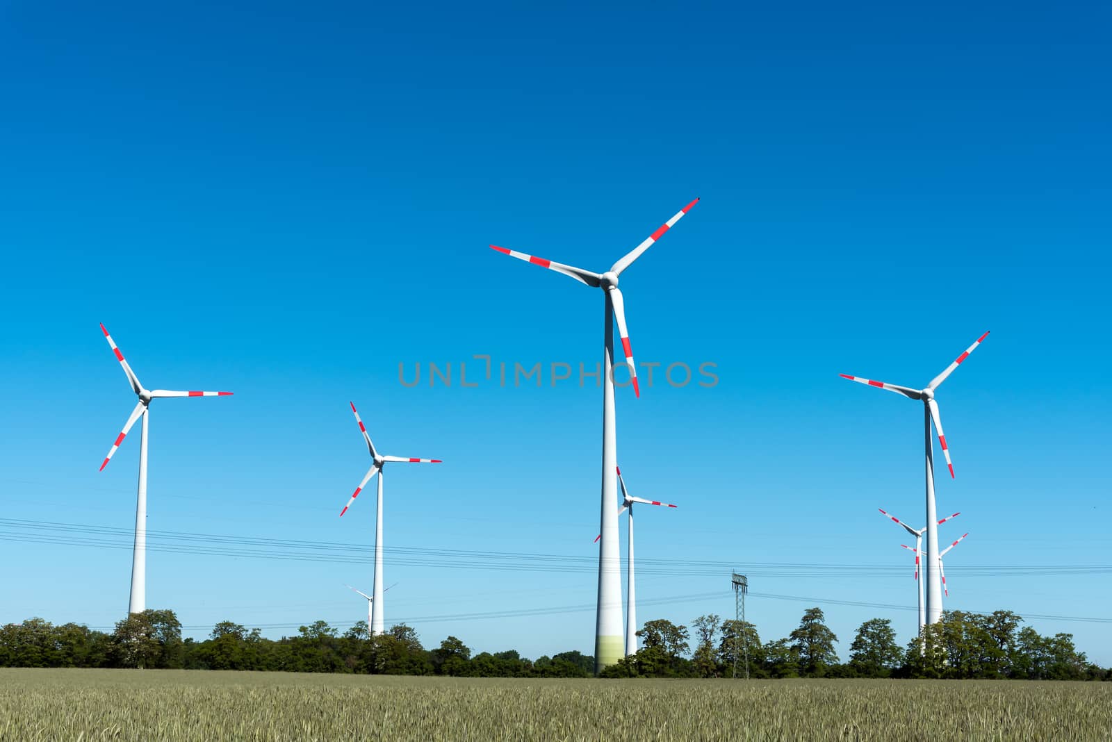 Wind power in the fields in Germany by elxeneize