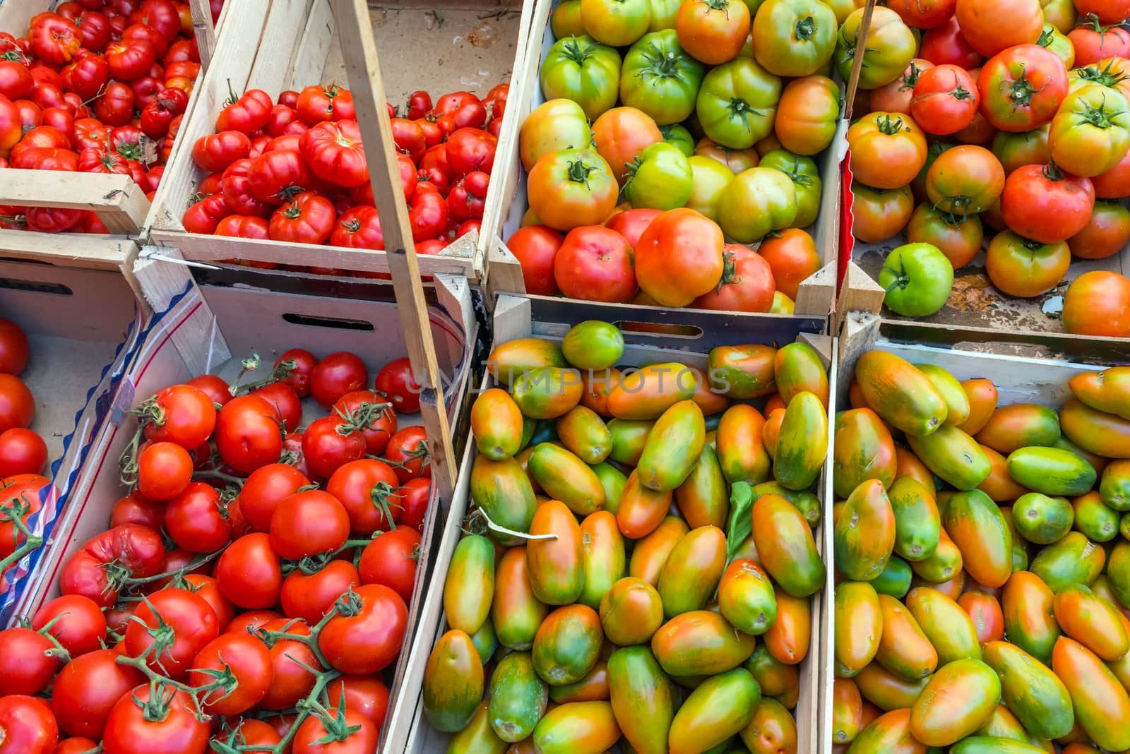 Tomatoes at a market in Palermo by elxeneize