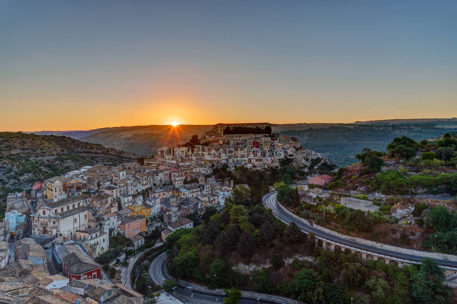 The sun rises over Ragusa Ibla in Sicily, Italy