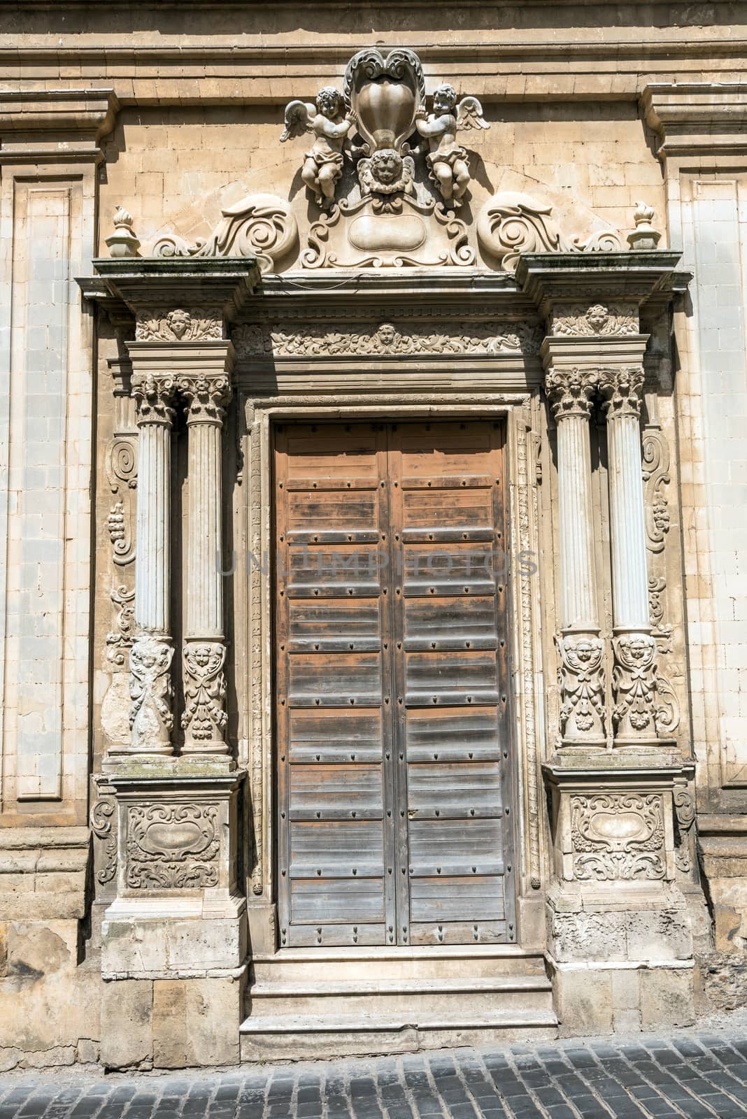 An ornated old door seen on Caltagirone, Sicily