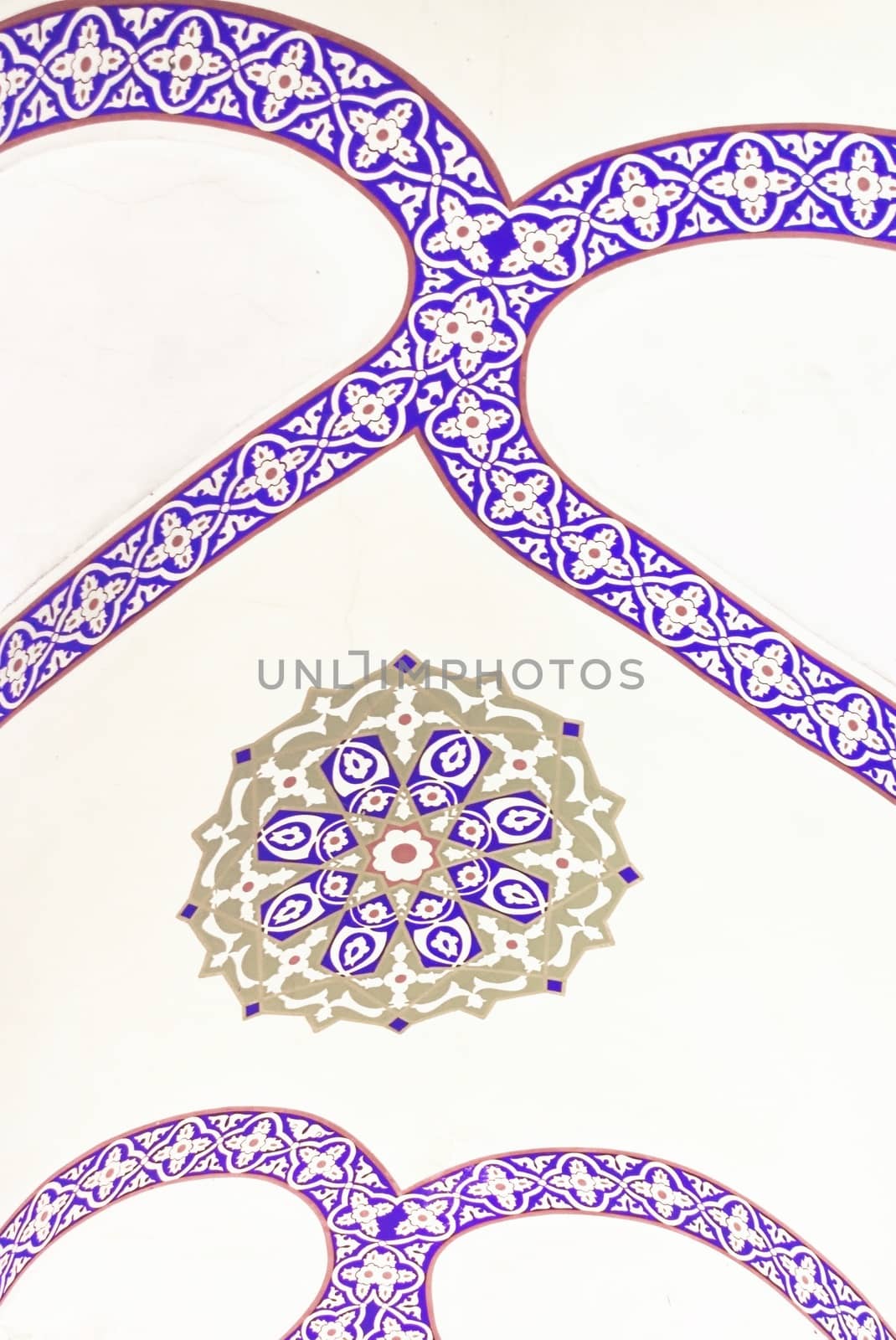 Blue and gold pattern in islamic style on a wall at Grand Bazaar of Istanbul. Close up detail. by hernan_hyper