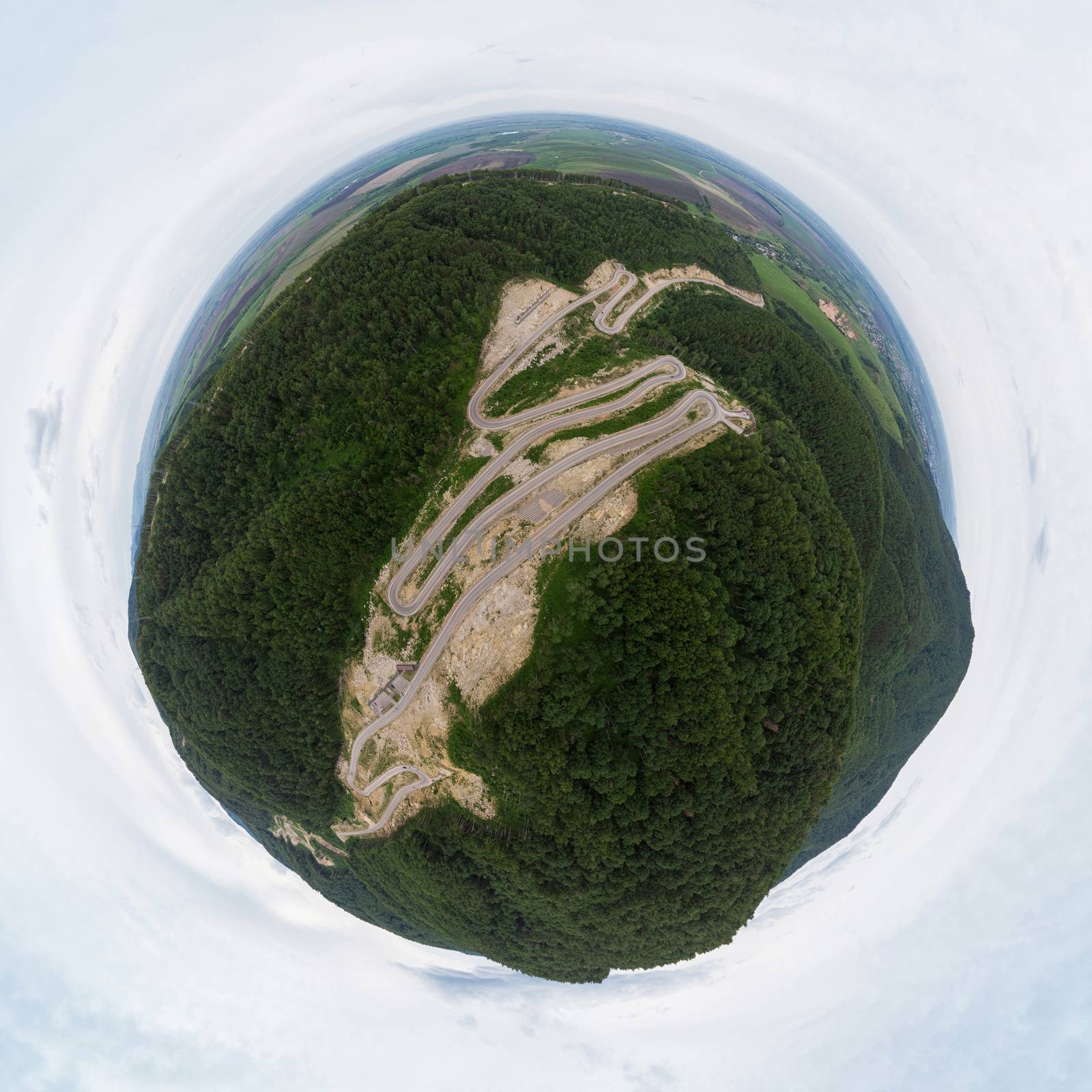 360 spherical panorama of aerial top vew of winding road in the mountains by rusak