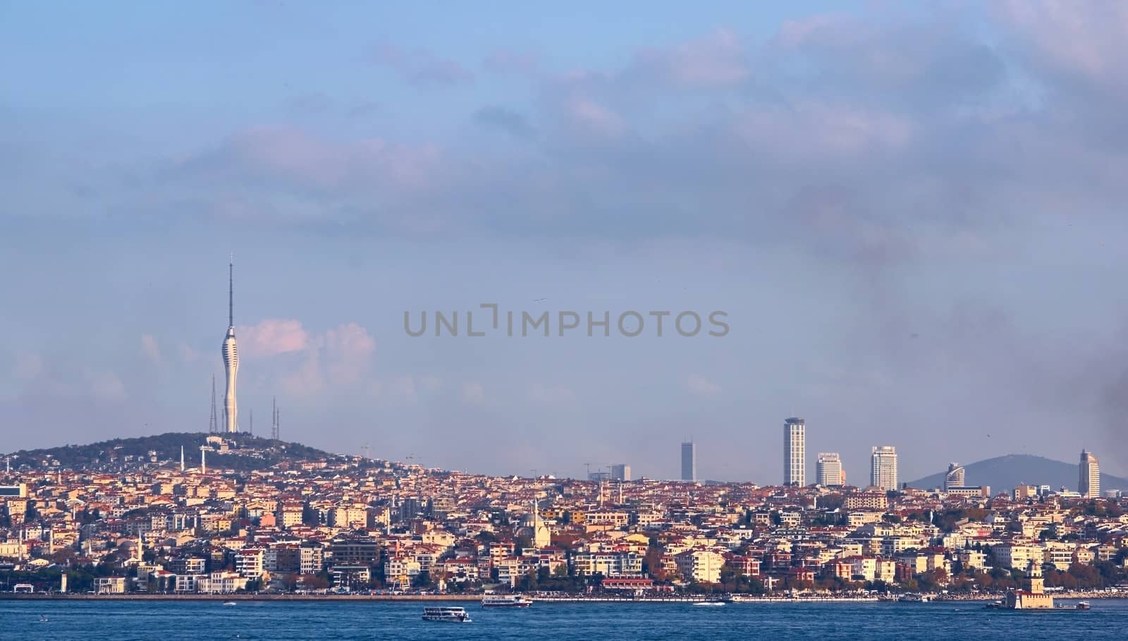 The futuristic Kucuk Camlica TV Radio Tower stands tall on the eastern side of Istambul, Turkey. Panoramic view from across the Bosphorus. by hernan_hyper