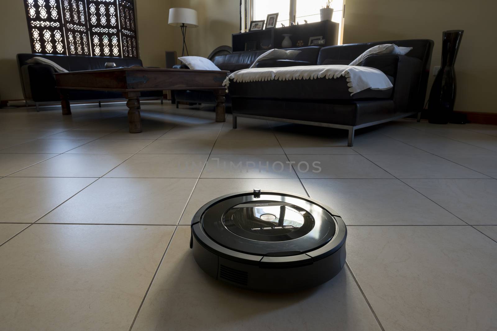 Roomba iRobot is an automated vacuum cleaning robot and powered by a rechargeable battery