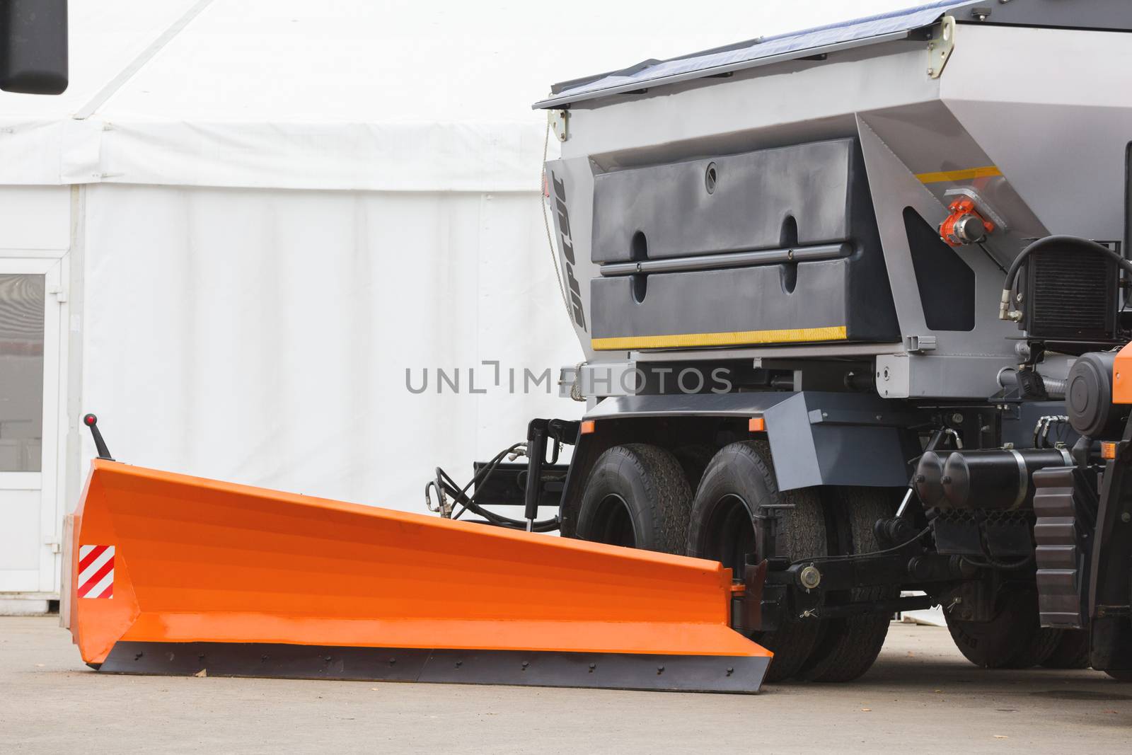 A dump truck for construction building outdoors, telephoto shot