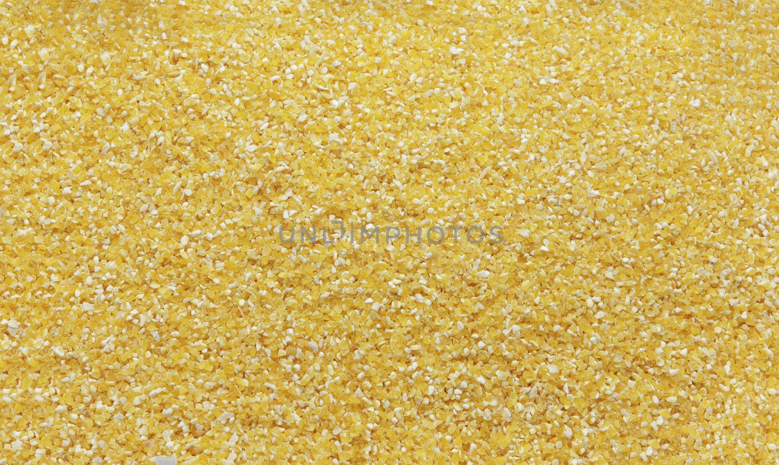 Corn groat -texture and details- traditional food, top view, closeup