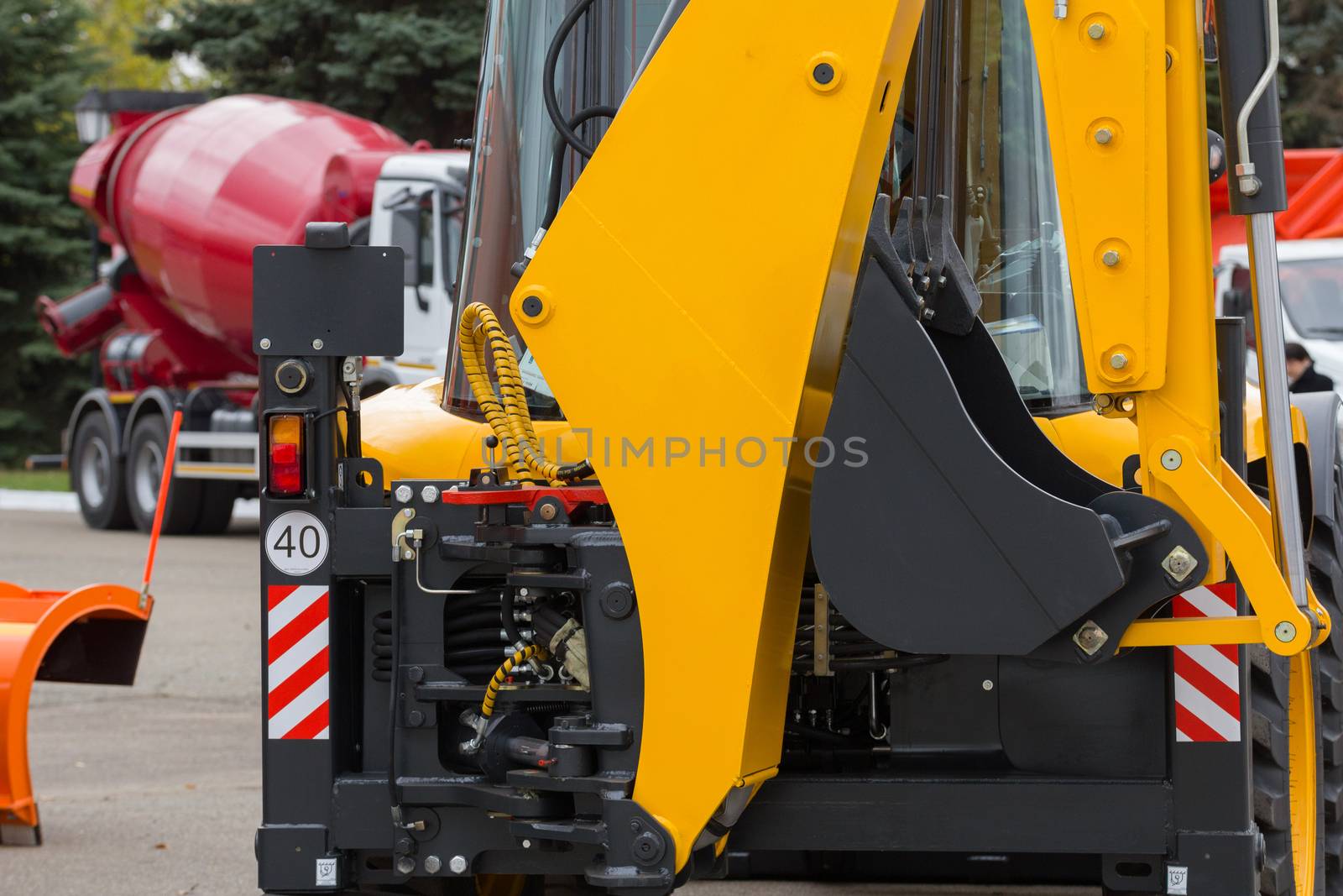 Excavator loader machine for construction building outdoors by Studia72