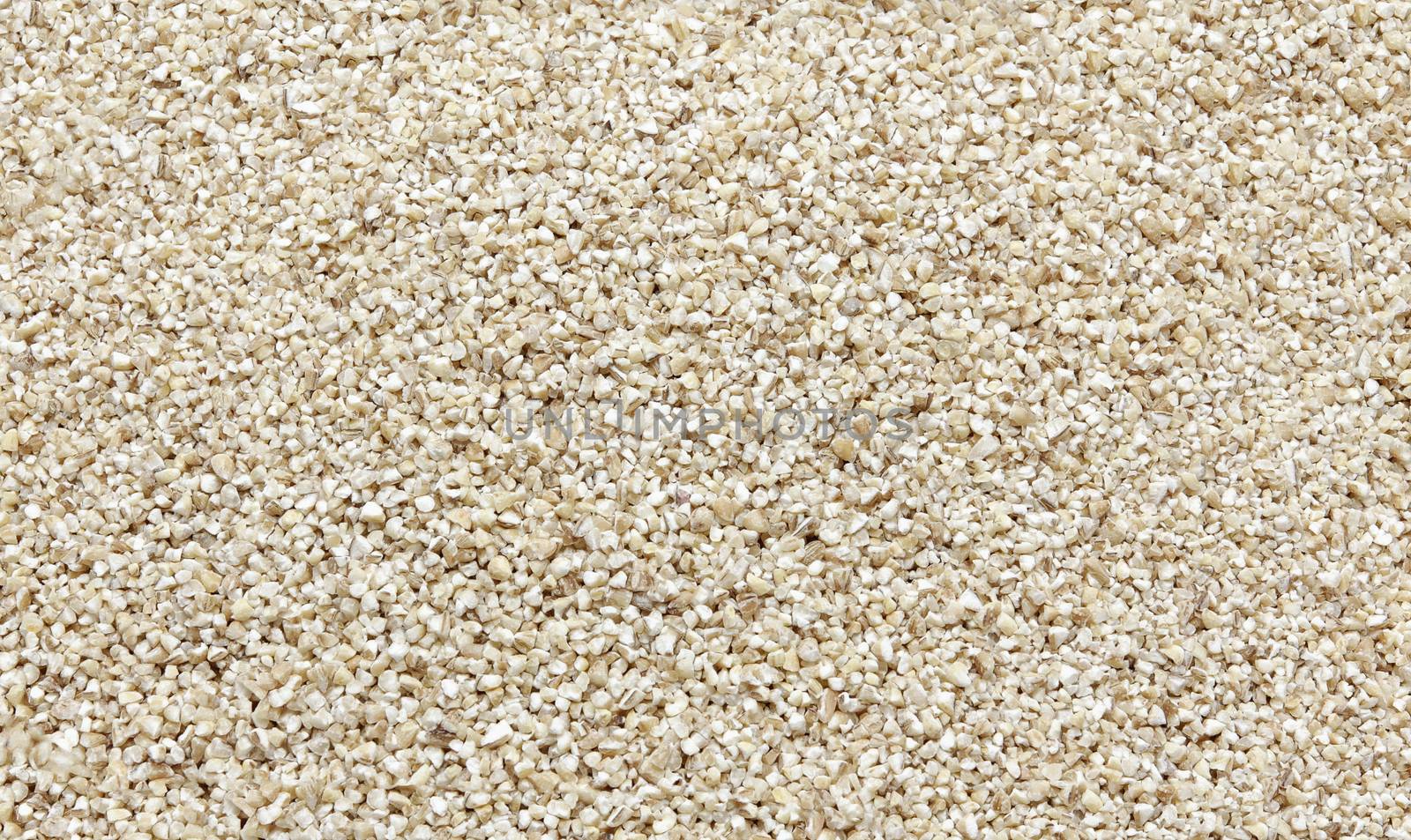 Crushed pearled barley -texture and details - traditional food, closeup