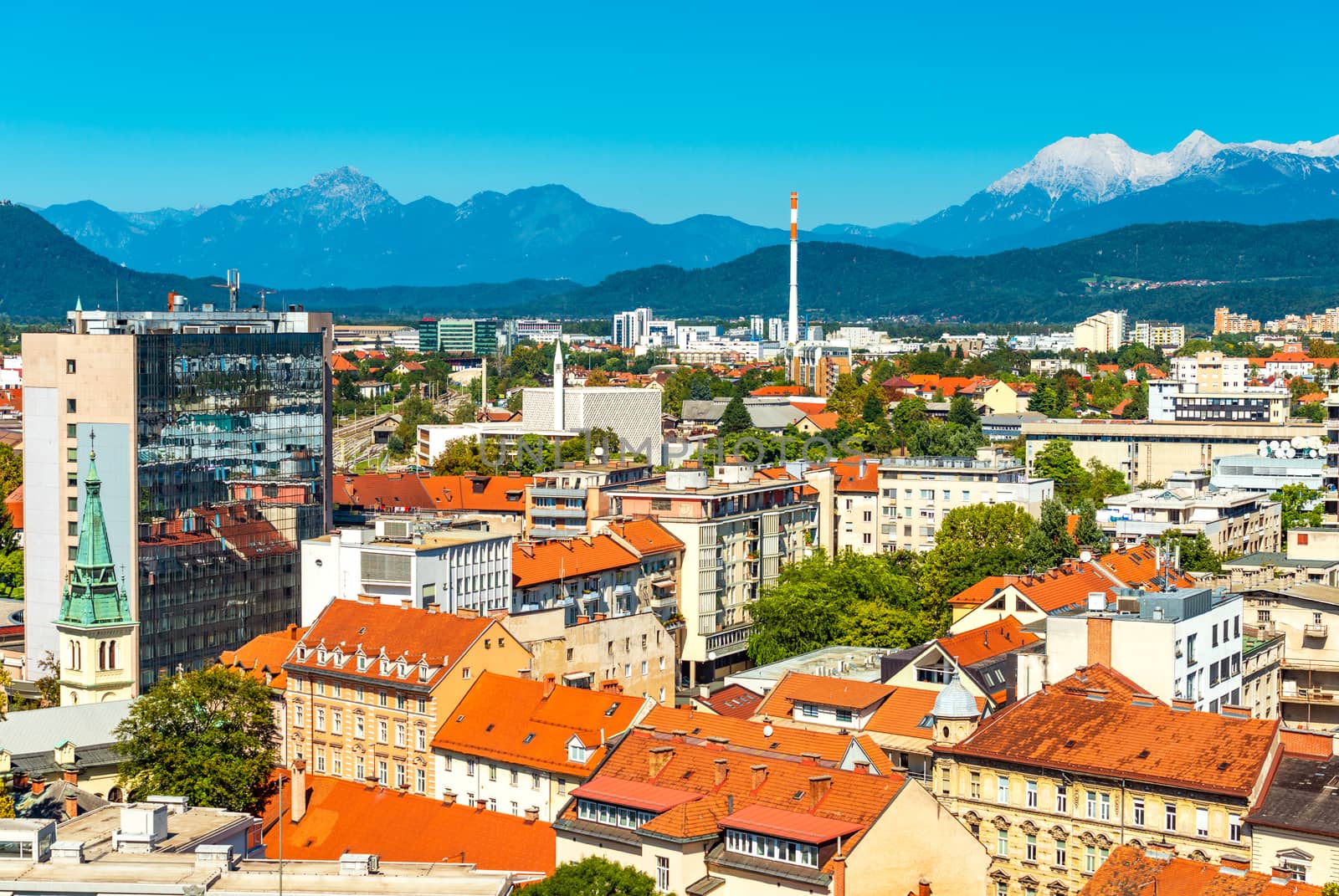 Beautiful cityscape of Ljubljana, panoramic view of the European city with mountains Alps in the background, Slovenia