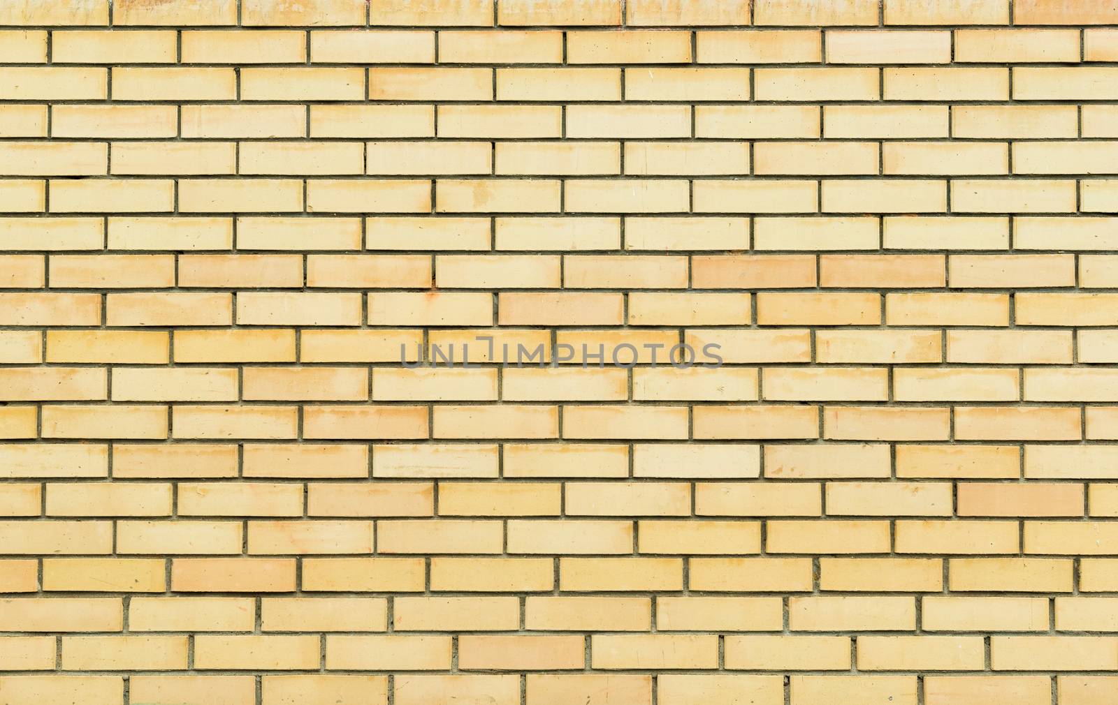 Yellow brick wall, brickwork texture, background