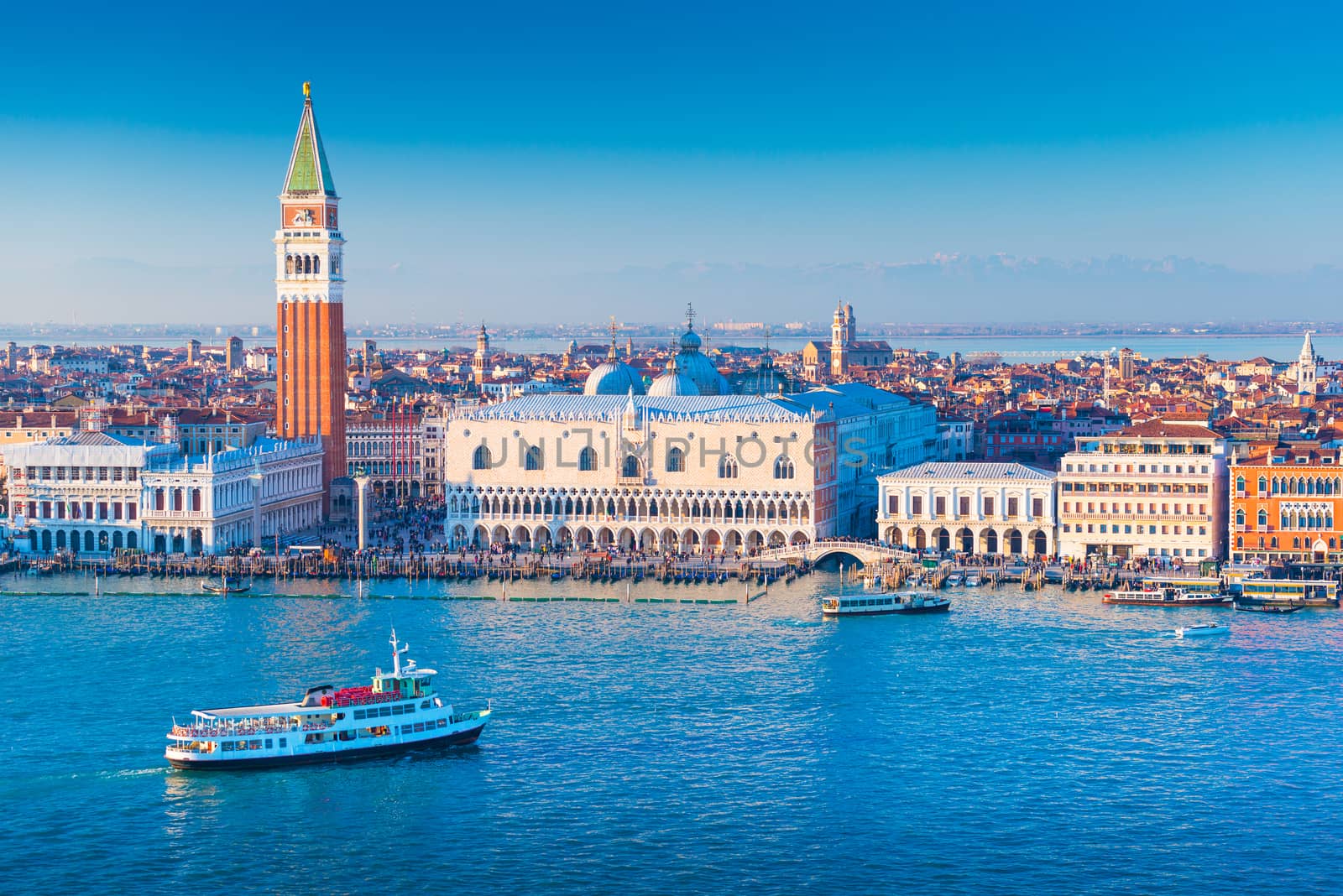Venice cityscape, Italy. Ship is floating in The Grand Canal of Venice. Aerial panorama of the most popular Italian city.
