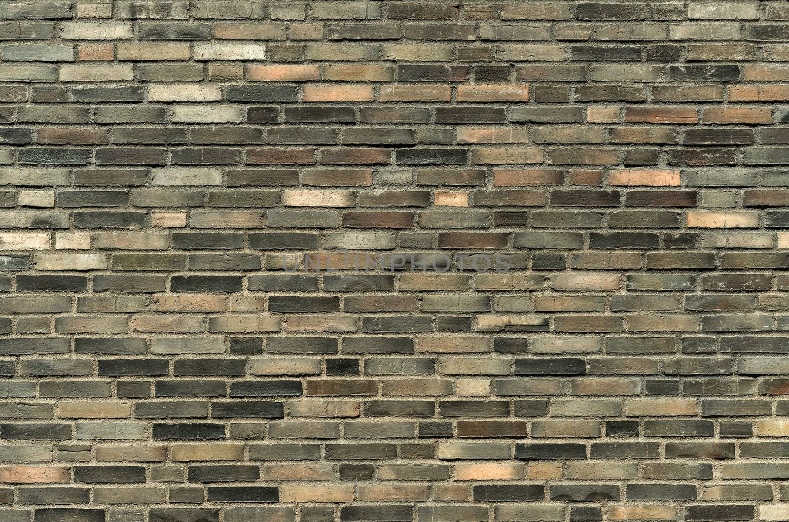 Dark brick wall texture. Brickwork pattern background