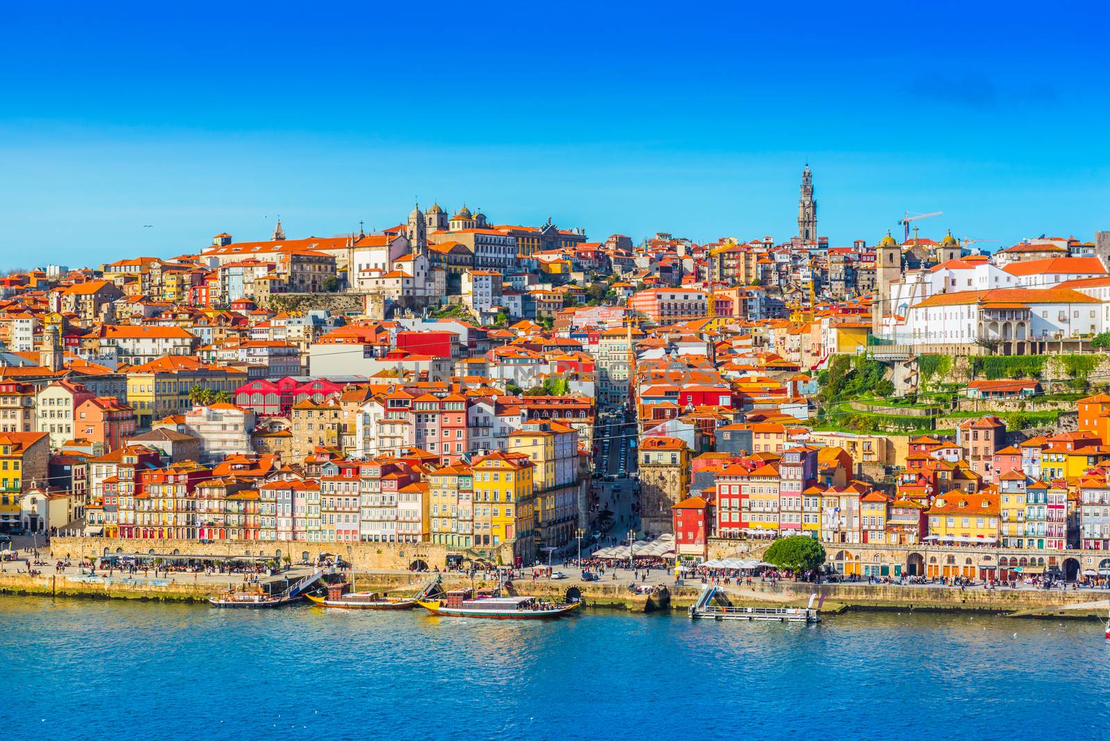 View of downtown Porto (Oporto), Portugal. Cityscape of the second-largest Portuguese city. (There are some cables of a cable road in the foreground)