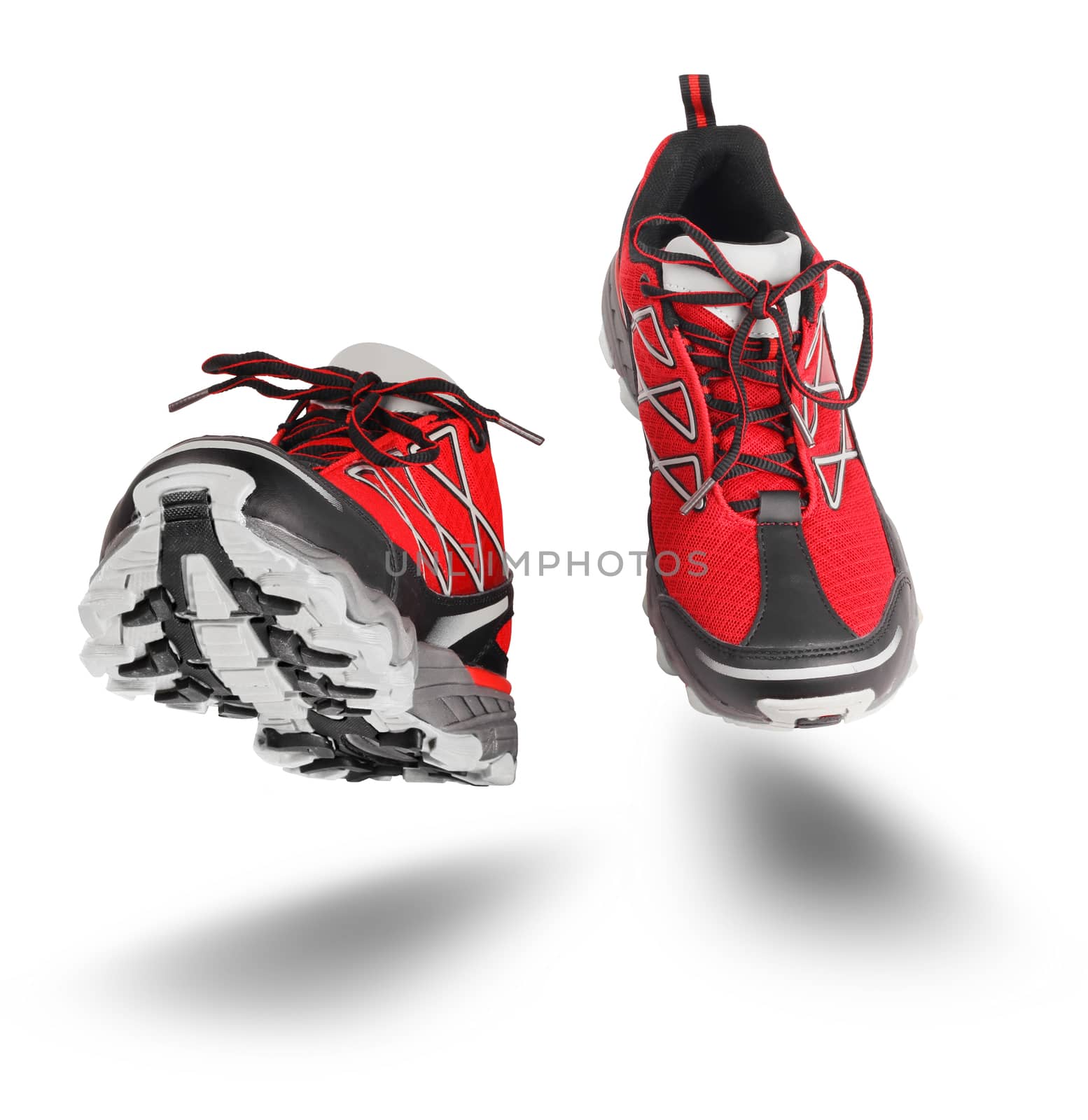 Red sport shoes running isolated on white by anterovium